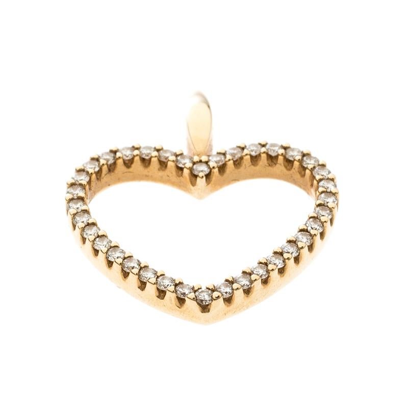 One look at this pendant by Bernhard H. Mayer and you'll know that beauty can come in small things too. Crafted from 18k yellow gold, this pendant is known as the Adonia Heart. It has been shaped like an open heart and meticulously adorned with