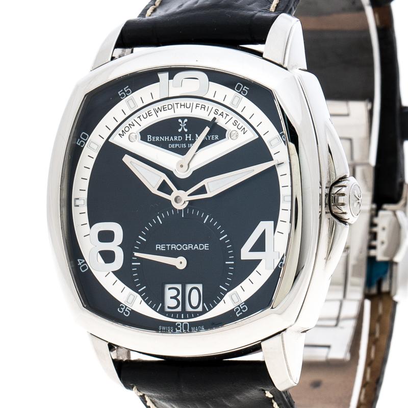 Portez le luxe à votre poignet en possédant cette montre-bracelet La Rétrograde II de Bernhard H. Mayer. De fabrication suisse et réalisée en acier inoxydable, cette montre est maintenue par des bracelets en cuir. Elle est équipée d'un mouvement à