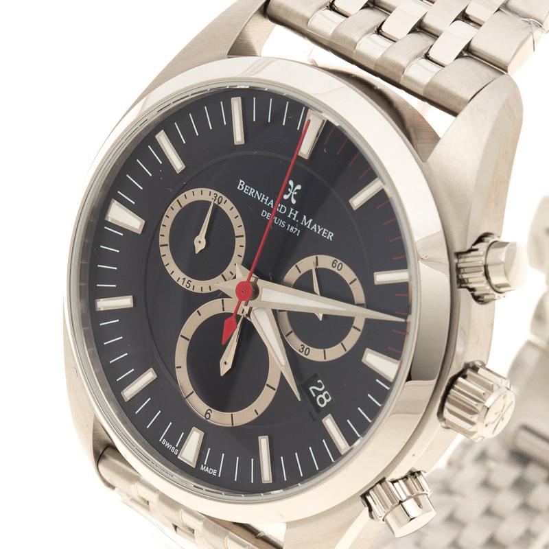Look effortlessly stylish and sophisticated with this stunning Bernhard H Mayer Ascent chronograph watch. Constructed in a chic and sophisticated stainless steel design, this watch features a seven layer link bracelet and a black dial. Also