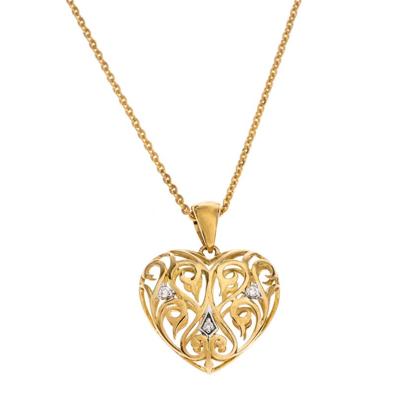 One look at this pendant by Bernhard H. Mayer and you'll know that beauty can come in small things too. Crafted from 18k yellow gold, this beautiful pendant is shaped like a heart with cutouts and meticulously adorned with finely cut diamonds. The