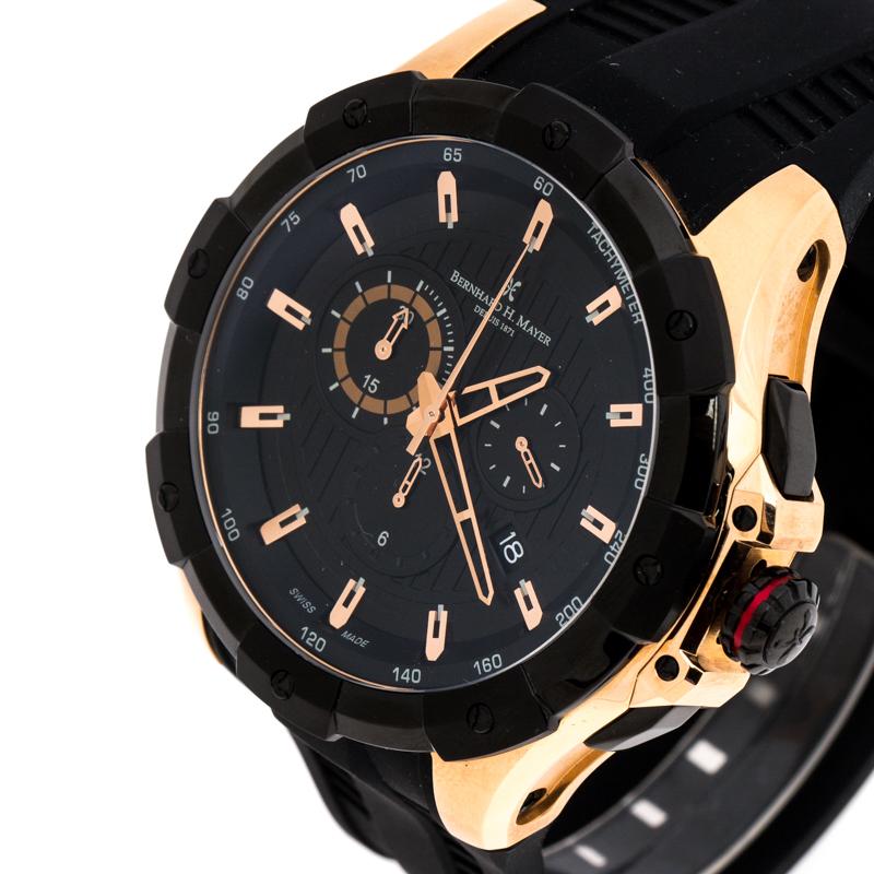 Wear luxury on your wrist by owning this Victor Chronograph wristwatch from Bernhard H. Mayer. Swiss made and created from rose gold-plated stainless steel, this watch is held by a rubber bracelet. It follows a quartz movement and has a black dial