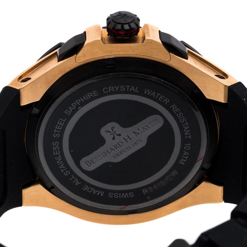 Wear luxury on your wrist by owning this Victor Chronograph wristwatch from Bernhard H. Mayer. Swiss made and created from rose gold-plated stainless steel, this watch is held by a rubber bracelet. It follows a quartz movement and has a black dial