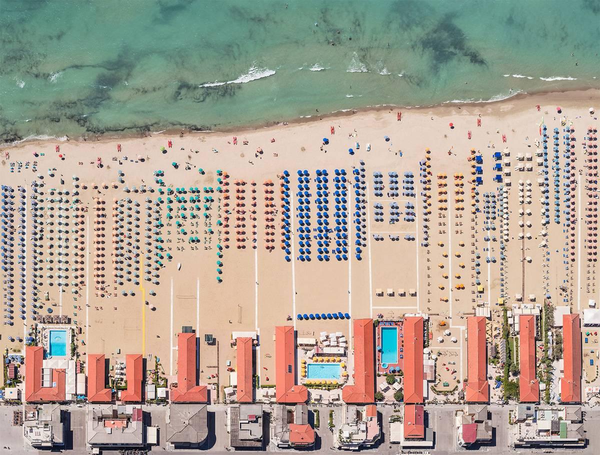 Aerial Views, Versilia 04 is a limited-edition photograph by German contemporary artist Bernhard Lang. 

This photograph is sold unframed as a print only. It is available in 3 dimensions:
*60 cm × 79 cm (23.6 × 31.1 in), edition of 10 copies
*91 cm