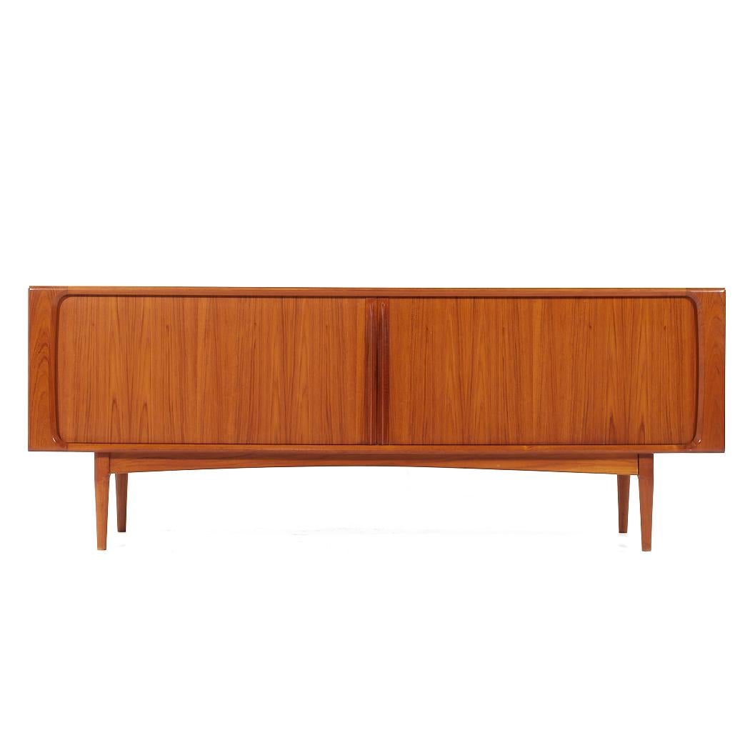 Bernhard Pedersen Mid Century Danish Teak Tambour Door Credenza

This credenza measures: 82.75 wide x 19.75 deep x 31.5 inches high

All pieces of furniture can be had in what we call restored vintage condition. That means the piece is restored upon