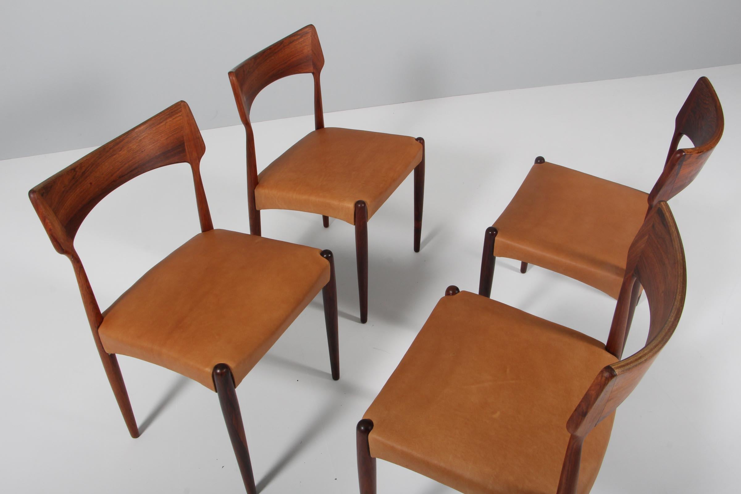 Bernhard Pedersen & Søn set of four dining chairs in partly solid rosewood.

New upholstered with tan aniline leather.

Made in the 1960s.