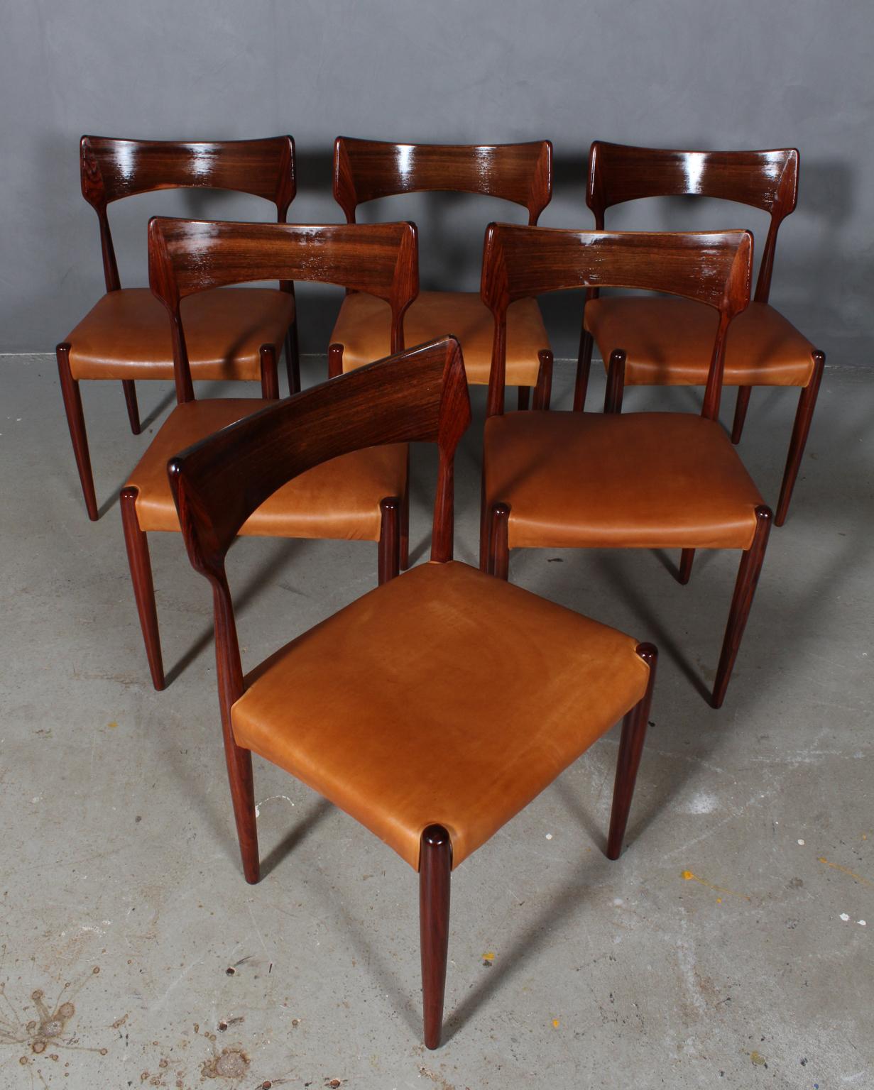 Bernhard Pedersen & Søn set of six dining chairs in partly solid rosewood.

New upholstered with vintage tan aniline leather.

Made in the 1960s.