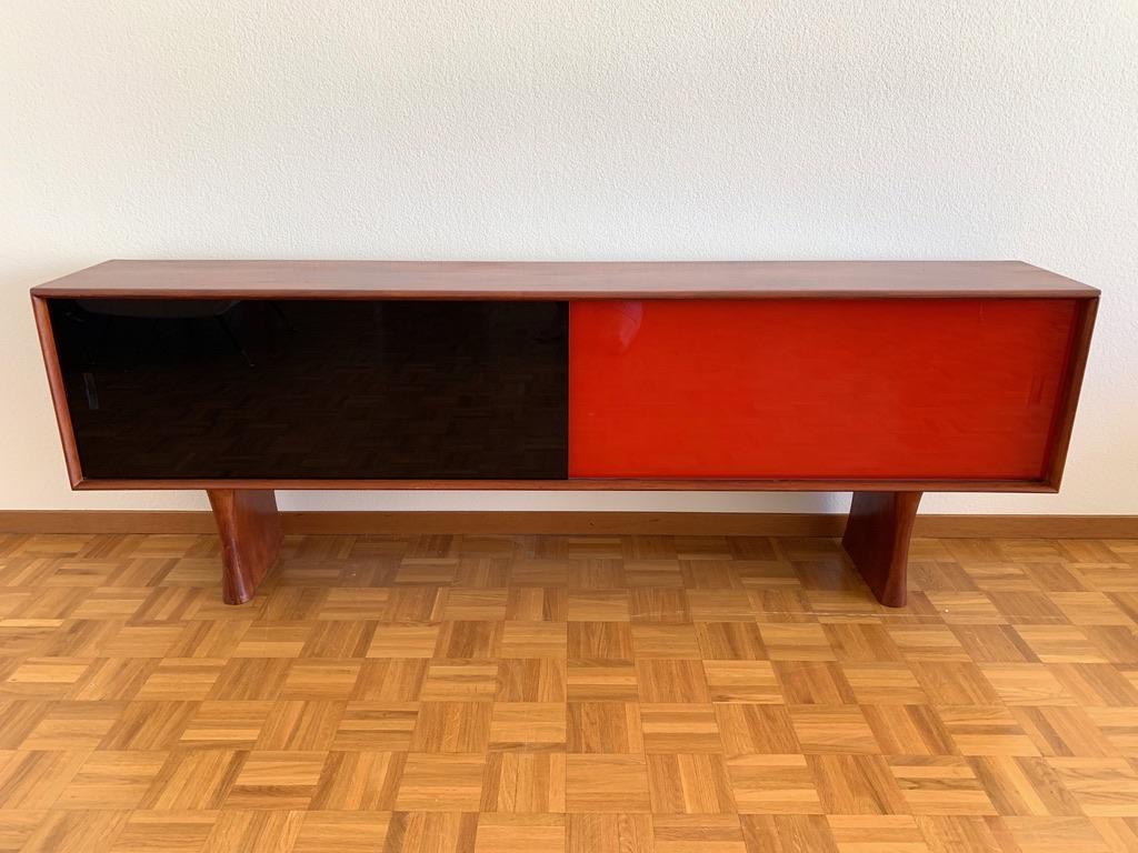 Low teak sideboard by Bernhard Pedersen & Son, Denmark, circa 1960s.

The Danish furniture maker Bernh. Pedersen & Son has a long and strong tradition in furniture and cabinetmaking stretching all the way back to the company’s start in 1902. 
The