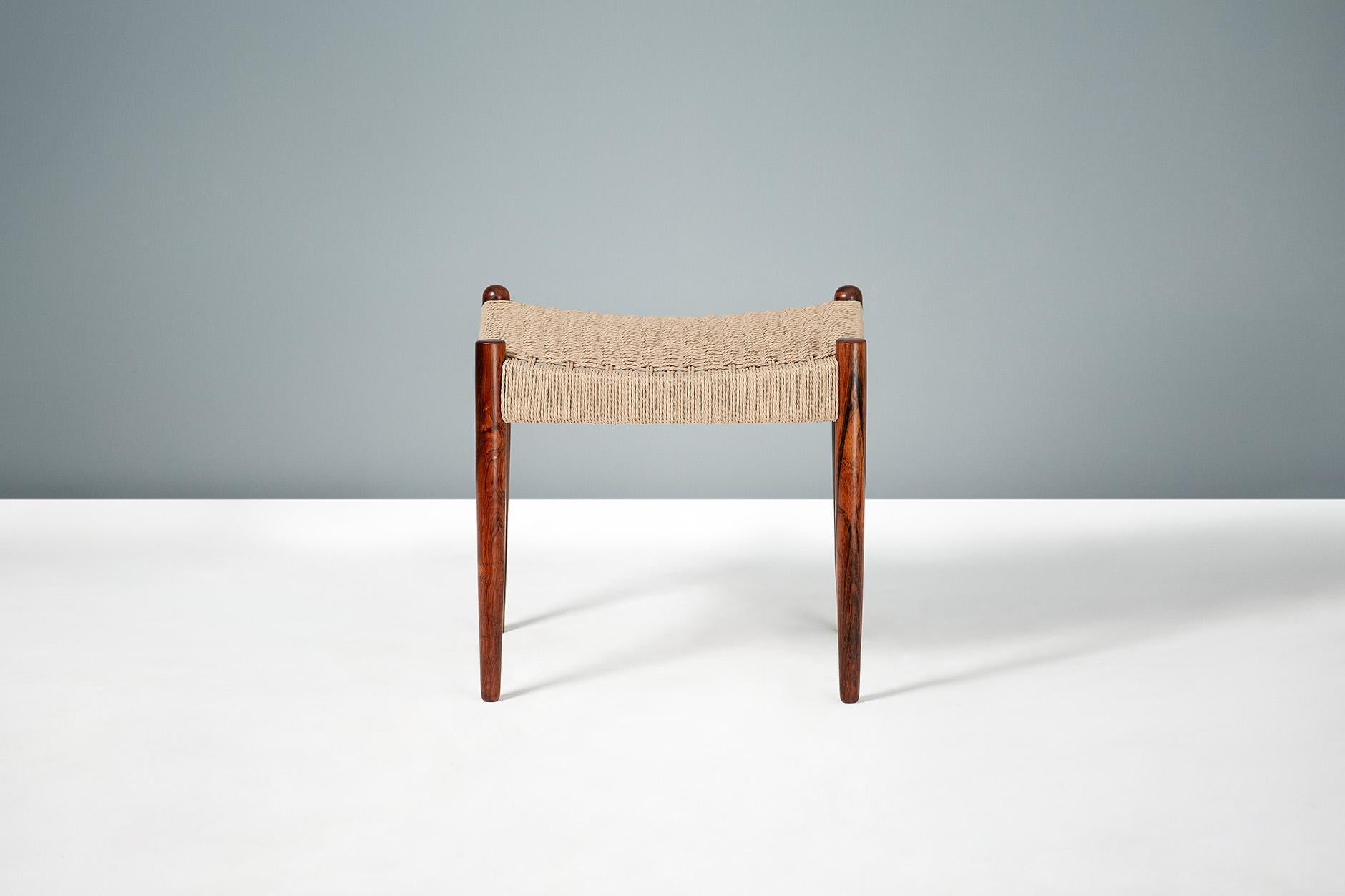Rosewood stool produced by Bernhard Petersen with newly woven papercord seat.

  