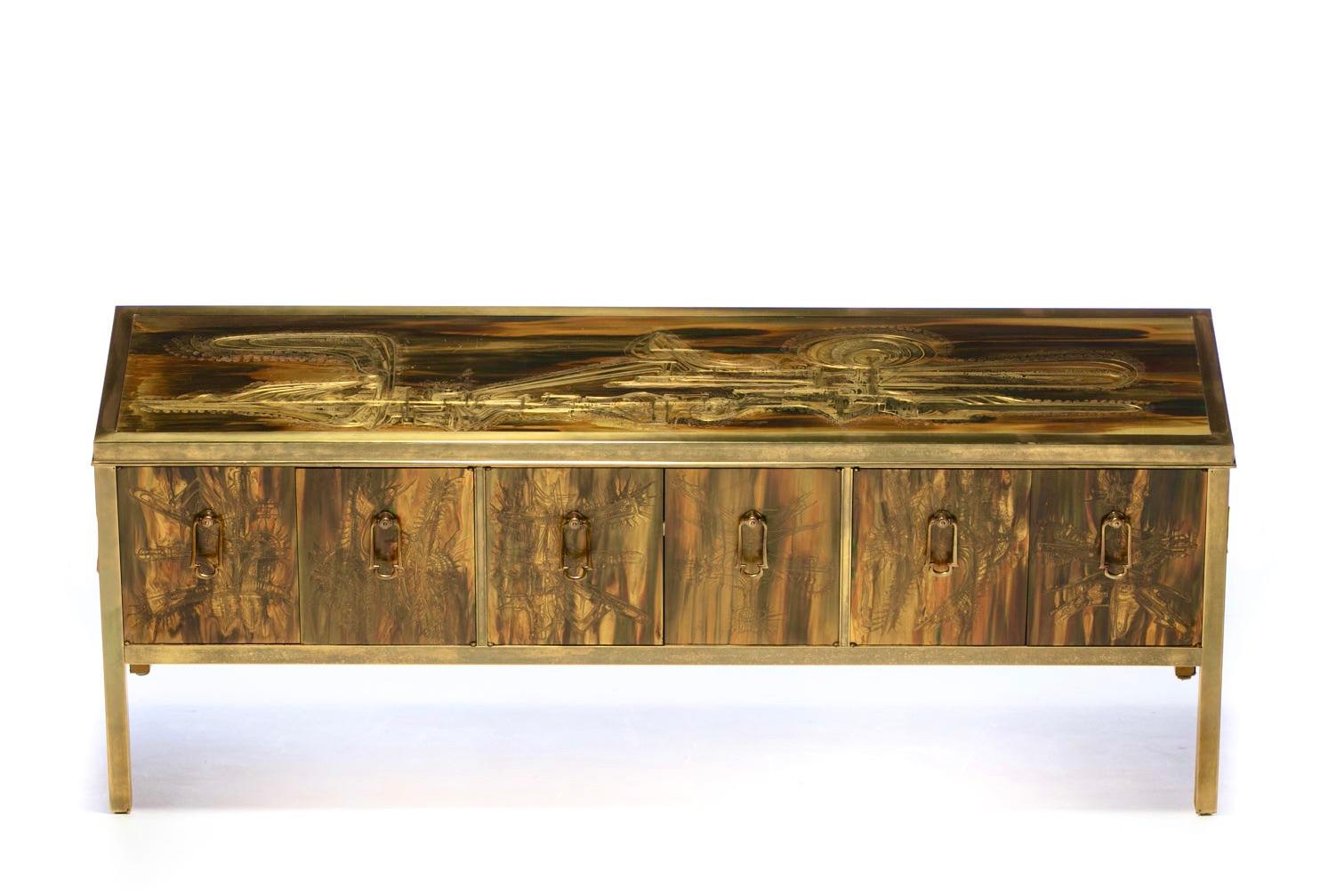 Hand-etched brass credenza or console by Bernhard Rohne for Mastercraft circa 1970s. This piece is truly furniture that's art. Artist Bernhard Rohne's acid etching technique on bronze produced some of the most uniquely beautiful pieces for