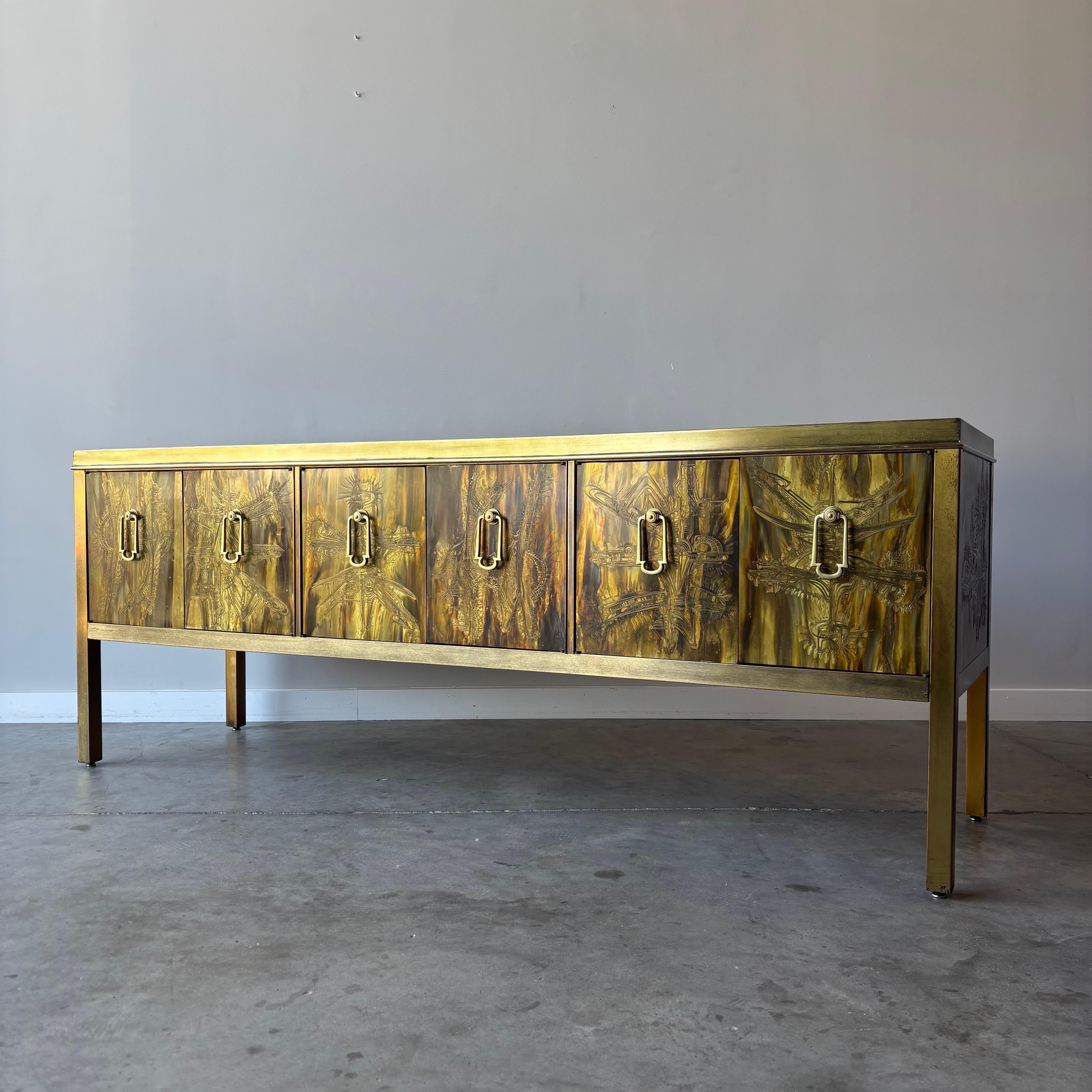 This exceptional credenza represents the pinnacle of 1970s design collaboration between artist Bernhard Rohne and Mastercraft Furniture. Rohne's distinctive approach to decorative metalwork transforms this piece into a functional work of art that
