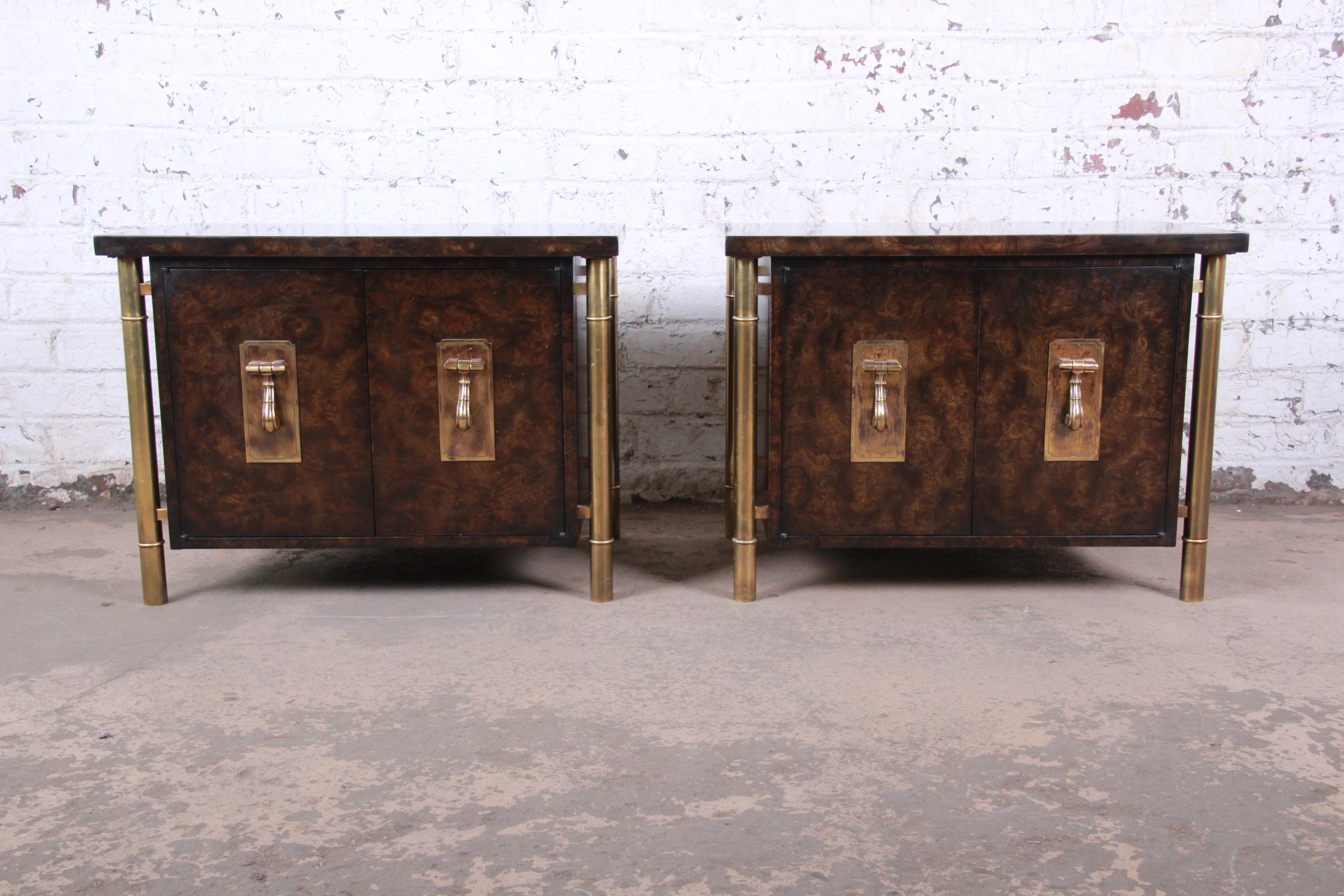 A gorgeous pair of Mid-Century Modern Hollywood Regency bedside chests or side tables

By Bernhard Rohne for Mastercraft

USA, 1970s

Burled Carpathian elm wood, with faux bamboo brass legs and hardware.

Measures: 32