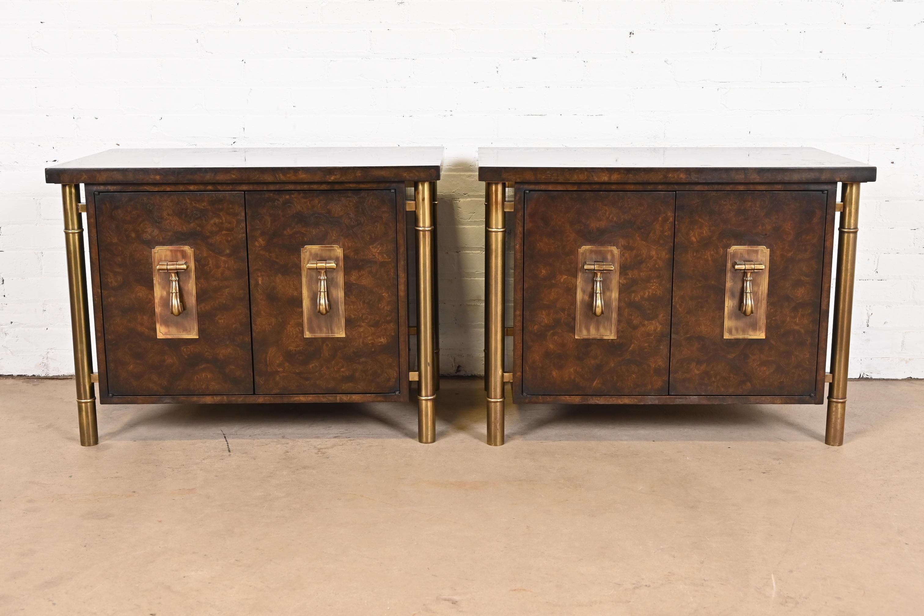 A gorgeous pair of Mid-Century Modern Hollywood Regency bedside chests

By Bernhard Rohne for Mastercraft Furniture

USA, 1970s

Burled Carpathian elm wood, with brass legs and original brass hardware.

Measures: 32