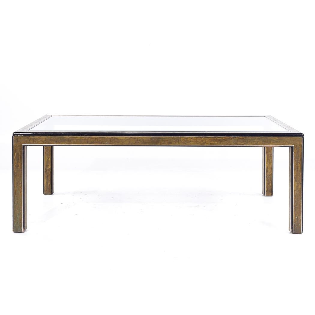 Bernhard Rohne for Mastercraft Mid Century Lacquered Etched Brass Panel Expanding Dining Table

This dining table measures: 84 wide x 47 deep x 29.5 inches high, with a chair clearance of 25.25 inches

All pieces of furniture can be had in what we