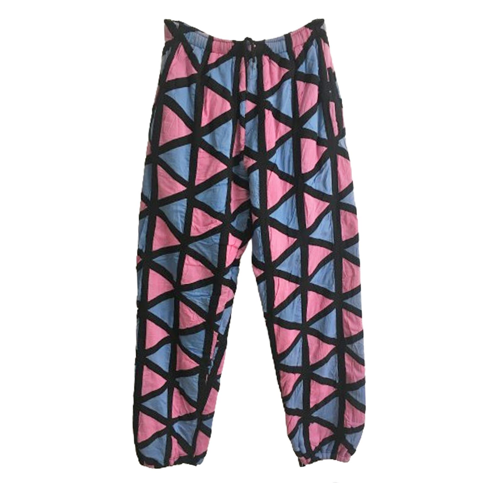 Bernhard Willhelm menswear AW 2003-2004 collection, iconic jogging pants. With string waist closure, two side pockets.
Diamonds like hexagonal pattern quilted, slightly padded material in pink and blue. 
Size : Free
