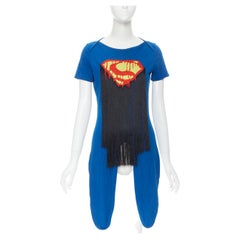 BERNHARD WILLHELM Superman-T-Shirt aus blauer Baumwolle mit Stickerei und schwarzen Fransen M