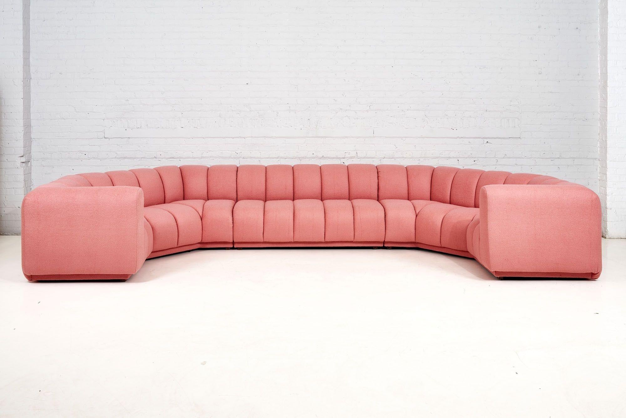 Bernhardt 3 Piece Sectional. 1970. Newly reupholstered and modified in pink boucle with channel tufting.