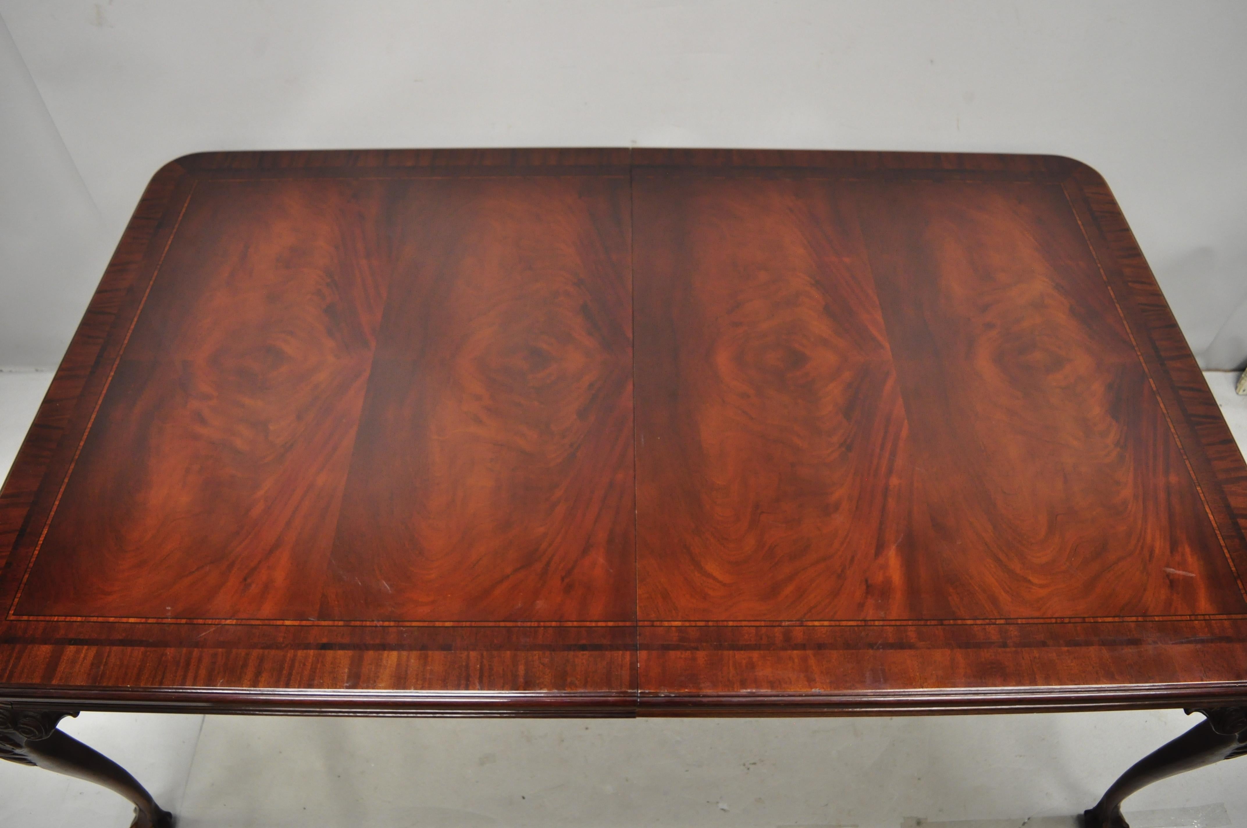 Bernhardt centennial Georgian Chippendale mahogany dining table with 2 leaves. Item features (2) 24