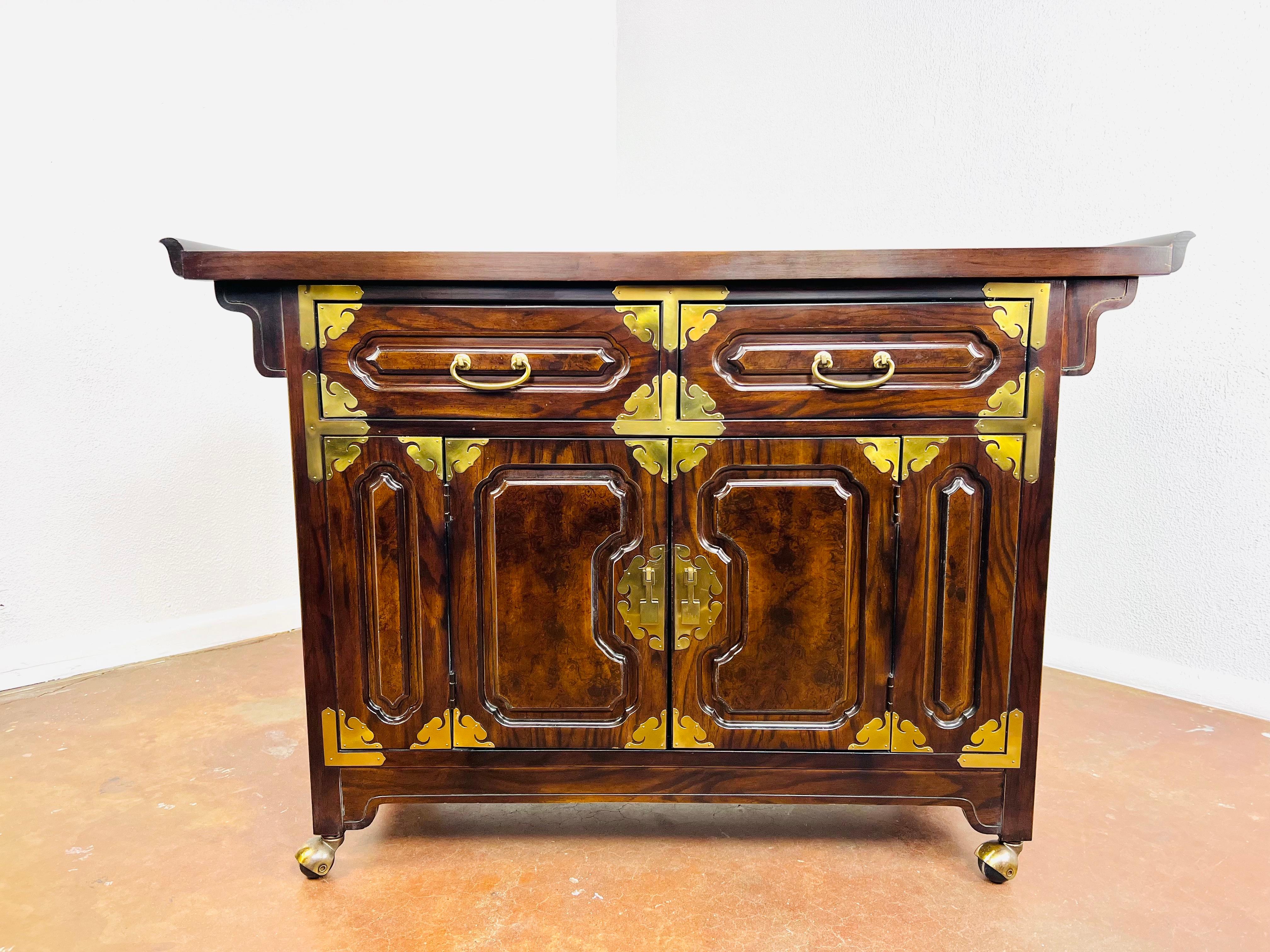 Vintage chinoiserie dry bar/server from the Pagoda Collection by Bernhardt. Features sturdy hardwood construction, beautiful lacquered burlwood, etched stone top surface, and two dovetailed drawers above two cabinet doors with brass hardware.