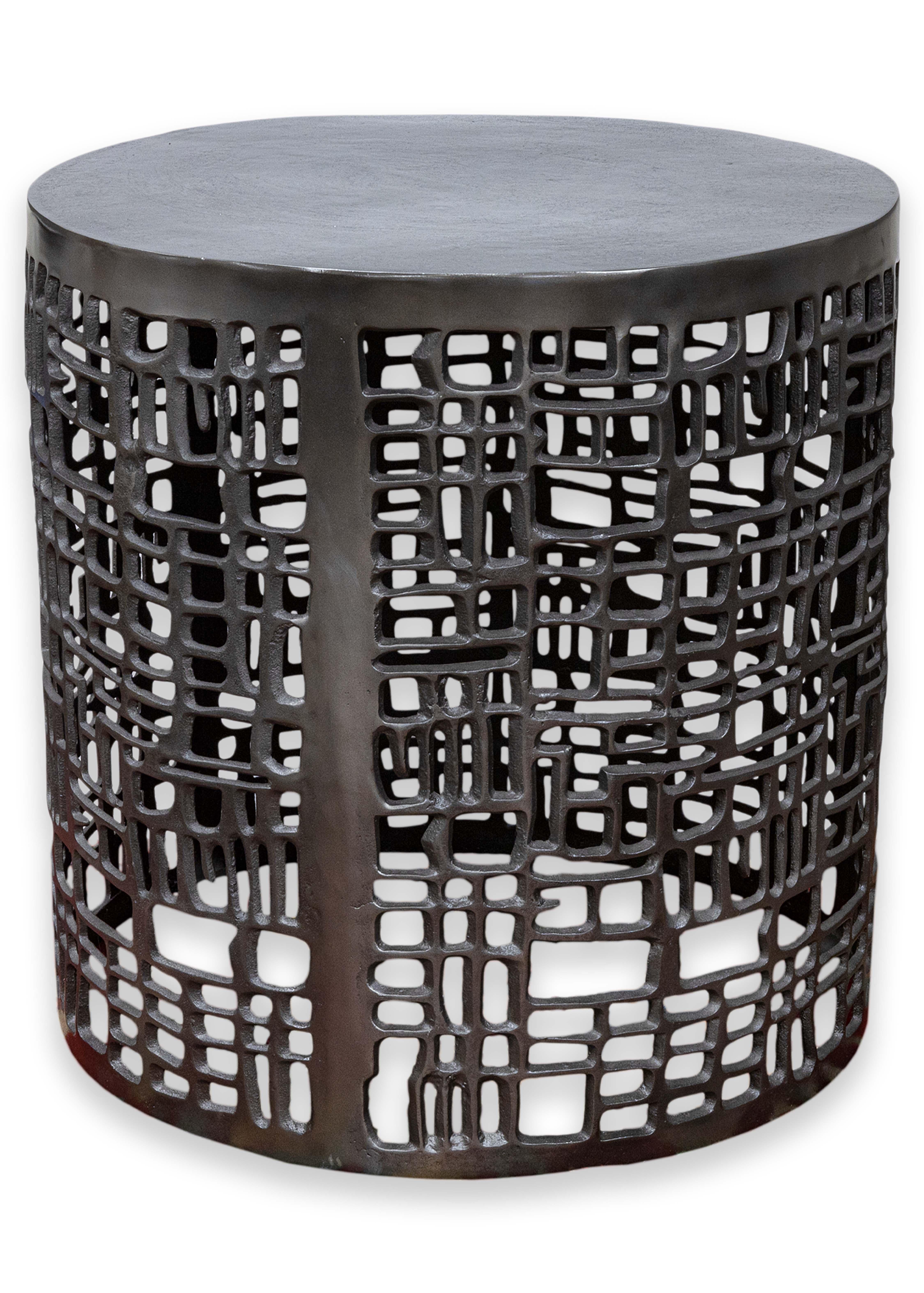 A Bernhardt Furniture brutalist side end table. A beautiful, sculptural table with a brutalist design. This table is large enough to be used as a small coffee table, or small enough to be used as an accent or side table. It features a full one piece