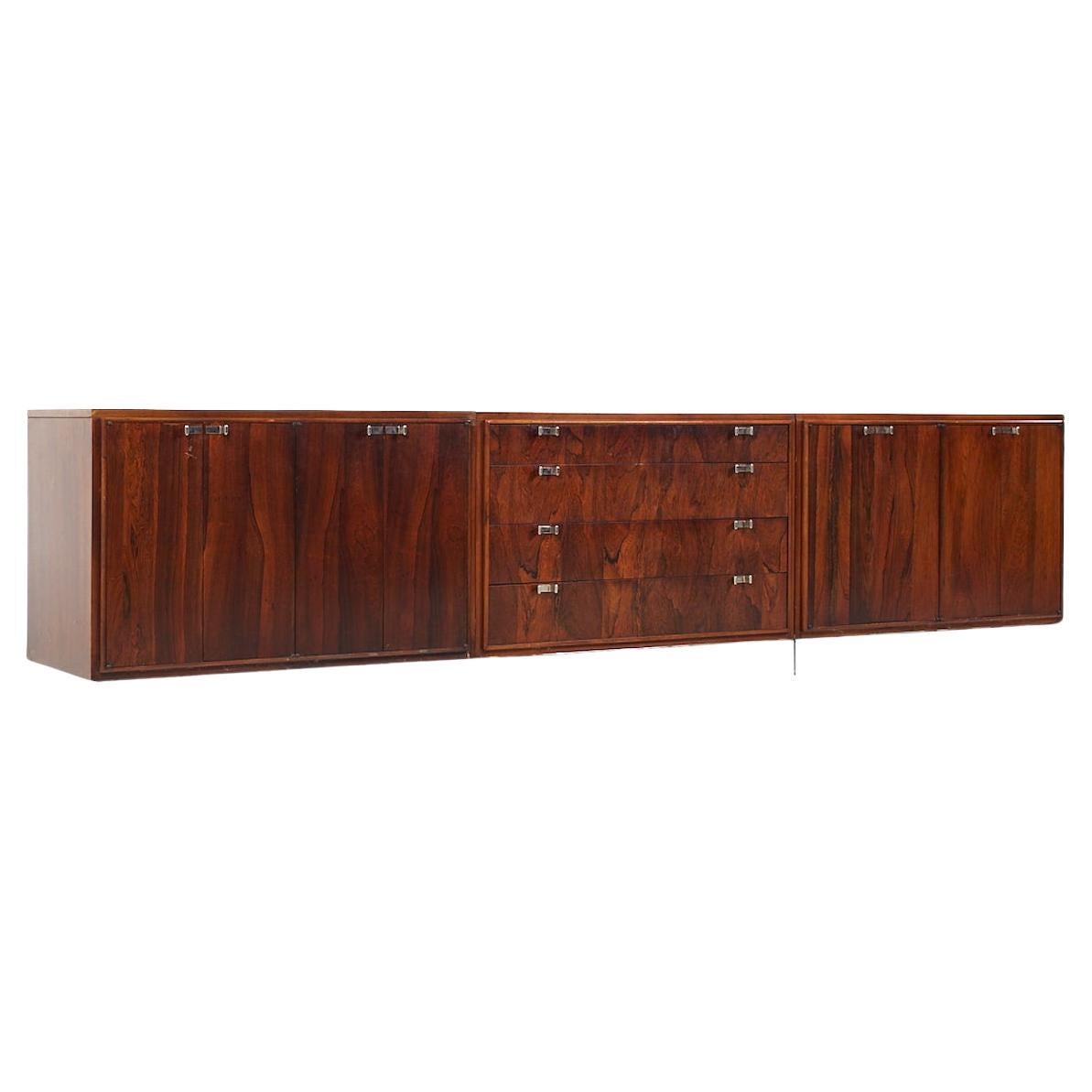 Bernhardt Flair Mid Century Rosewood and Chrome 3 Piece Credenza Set

Each piece of the ensemble measures: 40 wide x 20.5 deep x 29 high
The combined width of the ensemble is 120