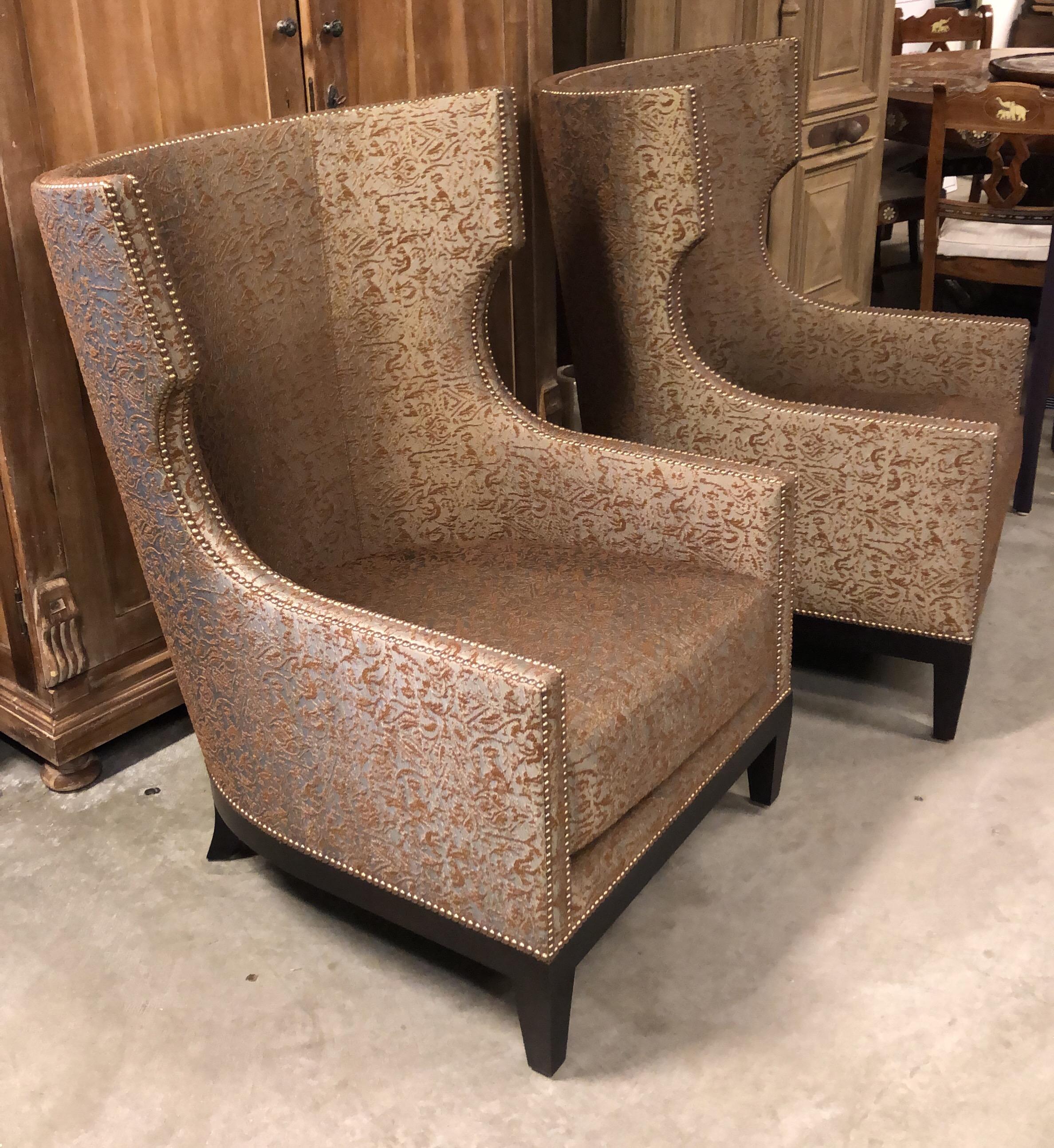 Design Plus Gallery presents a pair of Tule Chairs by Ironies. A classic wingback style with a slightly modern twist. Clean lines and smooth tailoring create the new age sophistication against a vintage accent. Upholstered in a designer textured