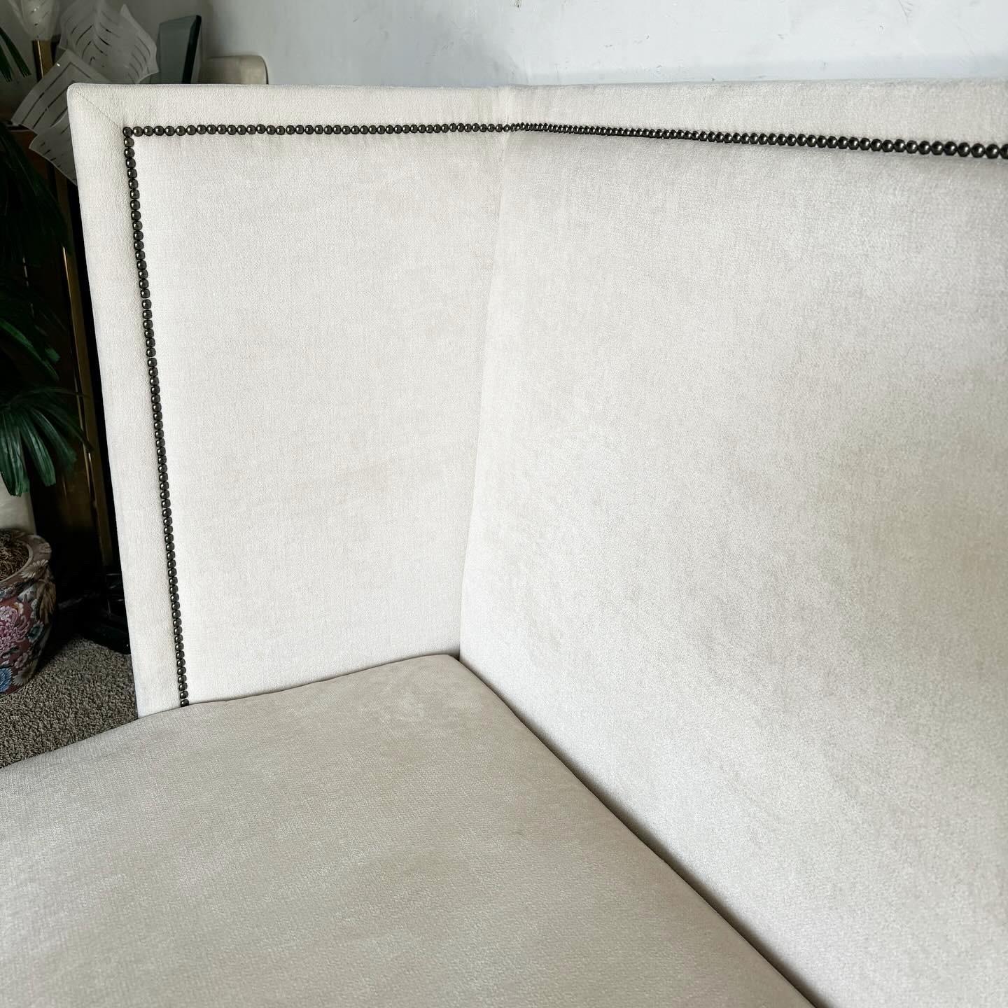 Bernhardt Ivory Fabric With Brushed Metal Nails Marcourt Banquette Sofa In Good Condition For Sale In Delray Beach, FL