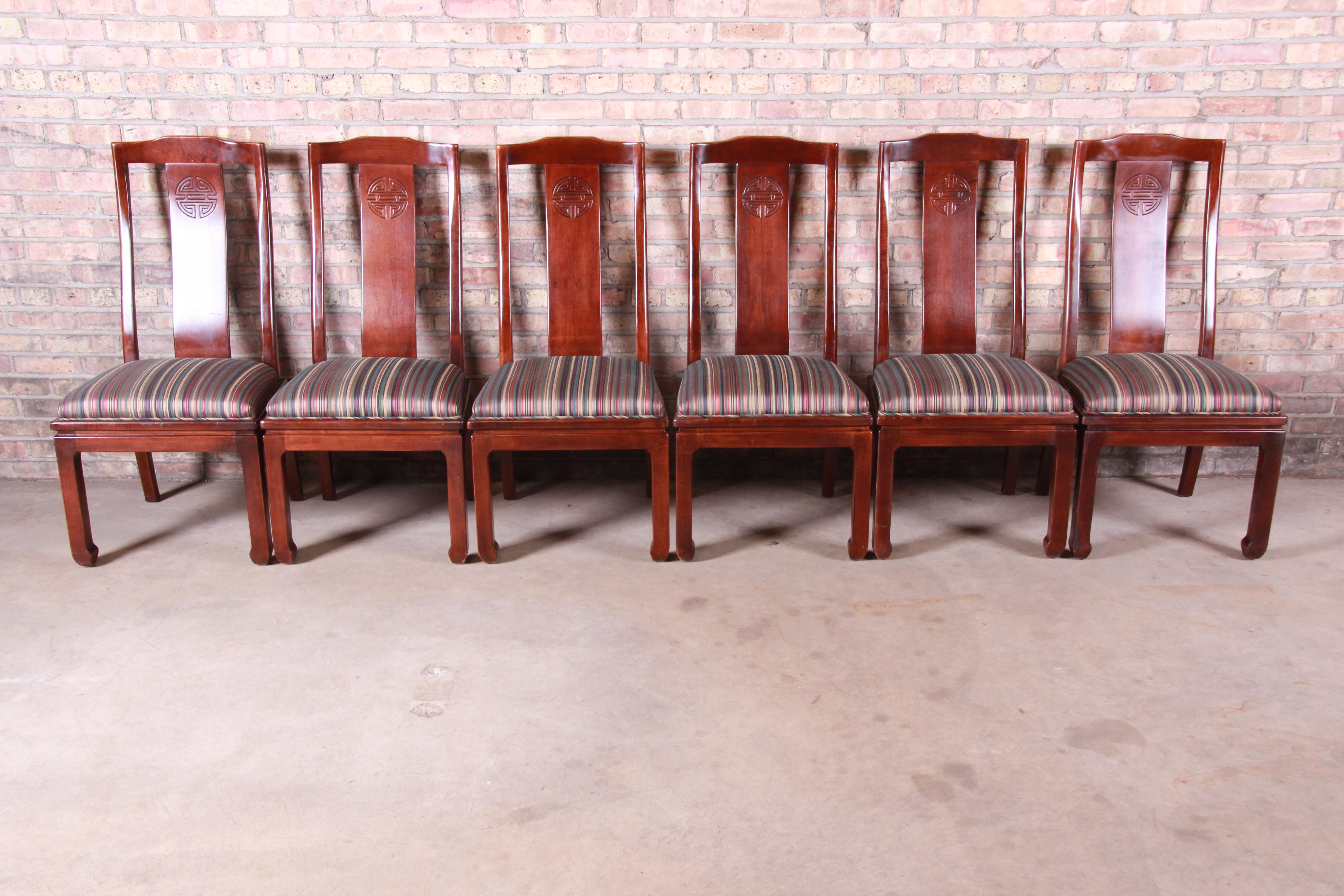 A gorgeous set of six Asian inspired dining chairs

By Bernhardt

USA, circa 1980s

Mahogany frames, with upholstered seats.

Measures: 21