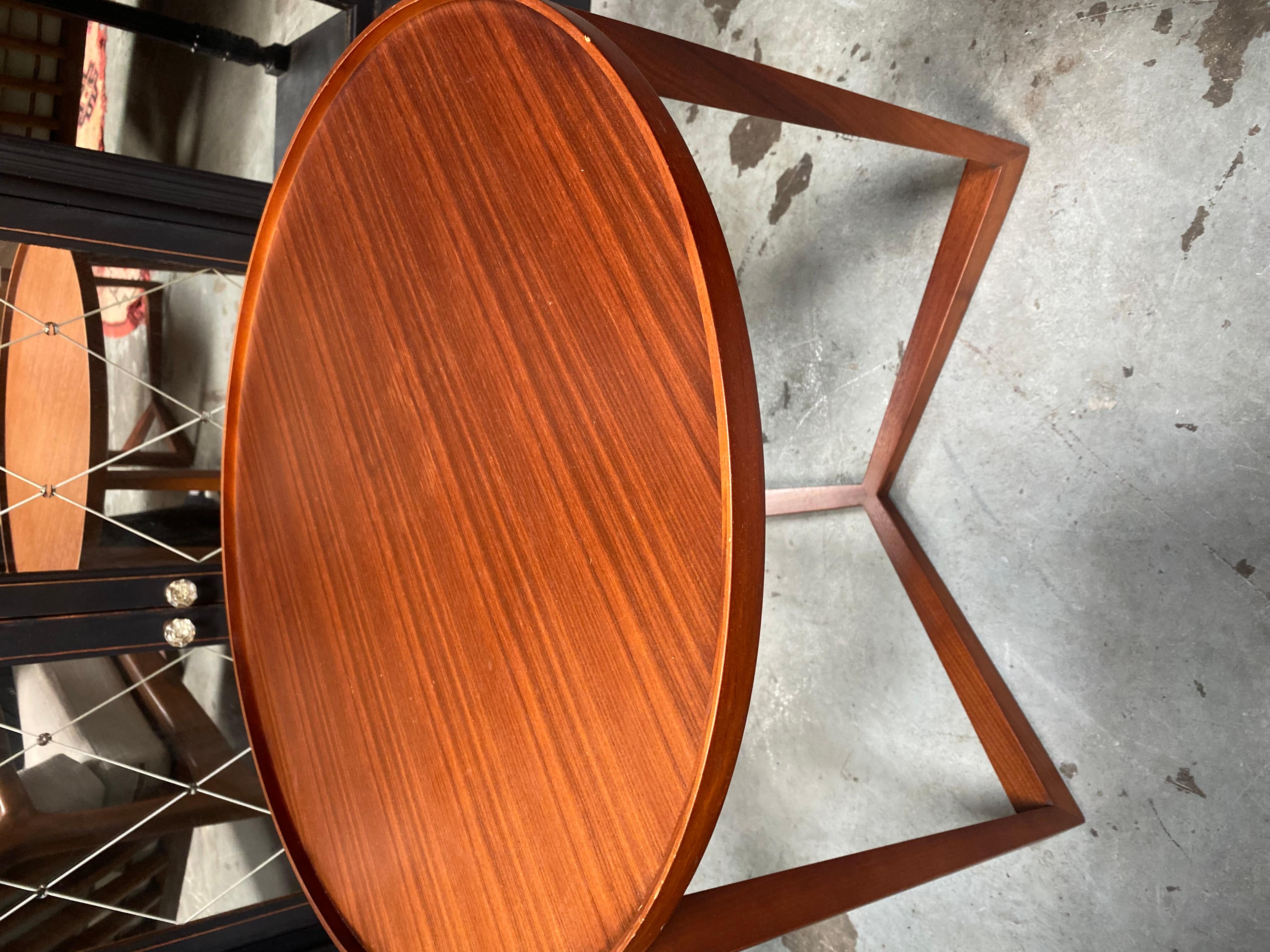 These are exceptionally well made maple side tables, no metal hardware was used in their construction. The maple lip extends fully around the diameter of the table's rim. Ideal in a Danish Modern esthetic or in the home of someone who enjoys fine