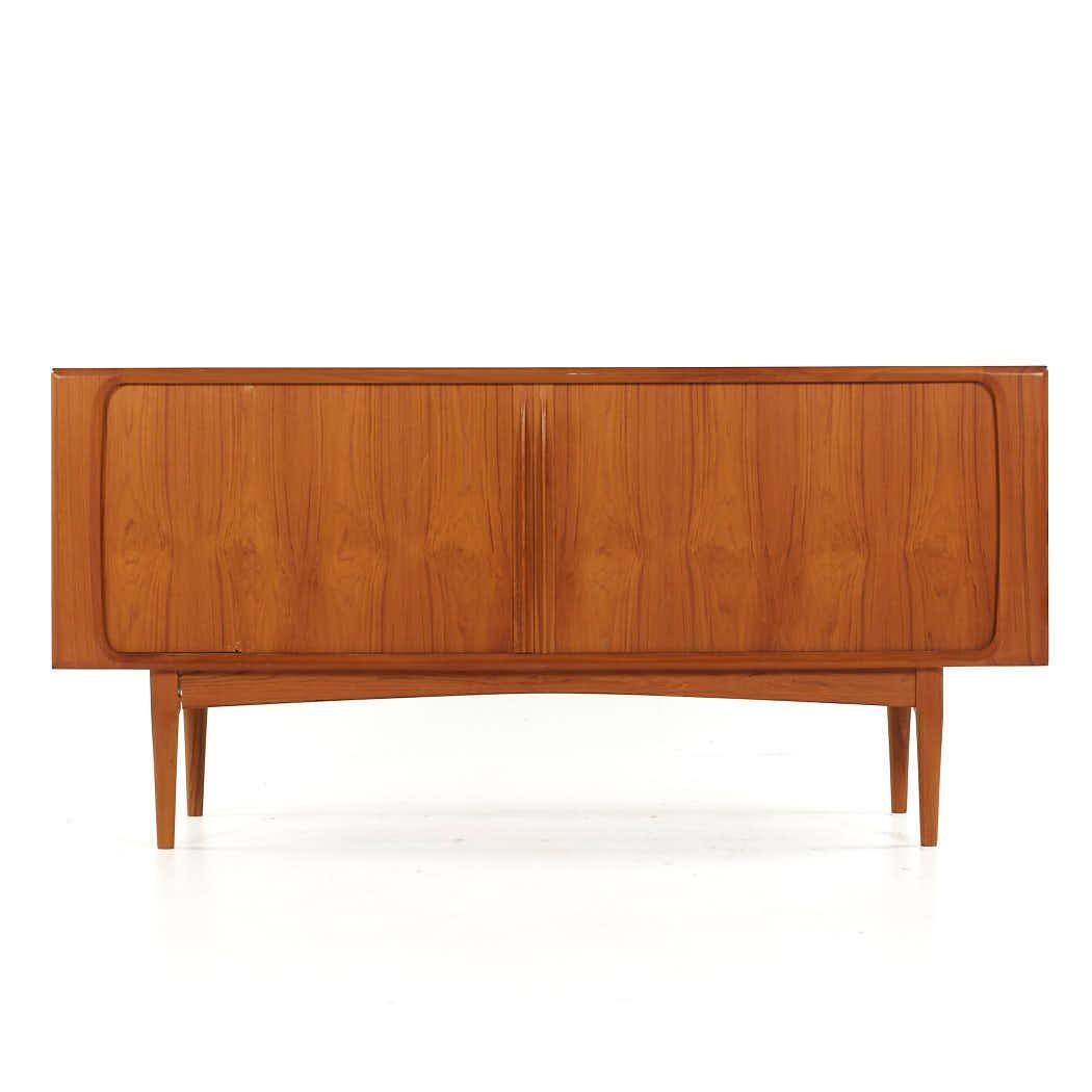 Bernhardt Pedersen Mid Century Danish Teak Tambour Door Credenza

This credenza measures: 65 wide x 19.75 deep x 31.5 inches high

All pieces of furniture can be had in what we call restored vintage condition. That means the piece is restored upon