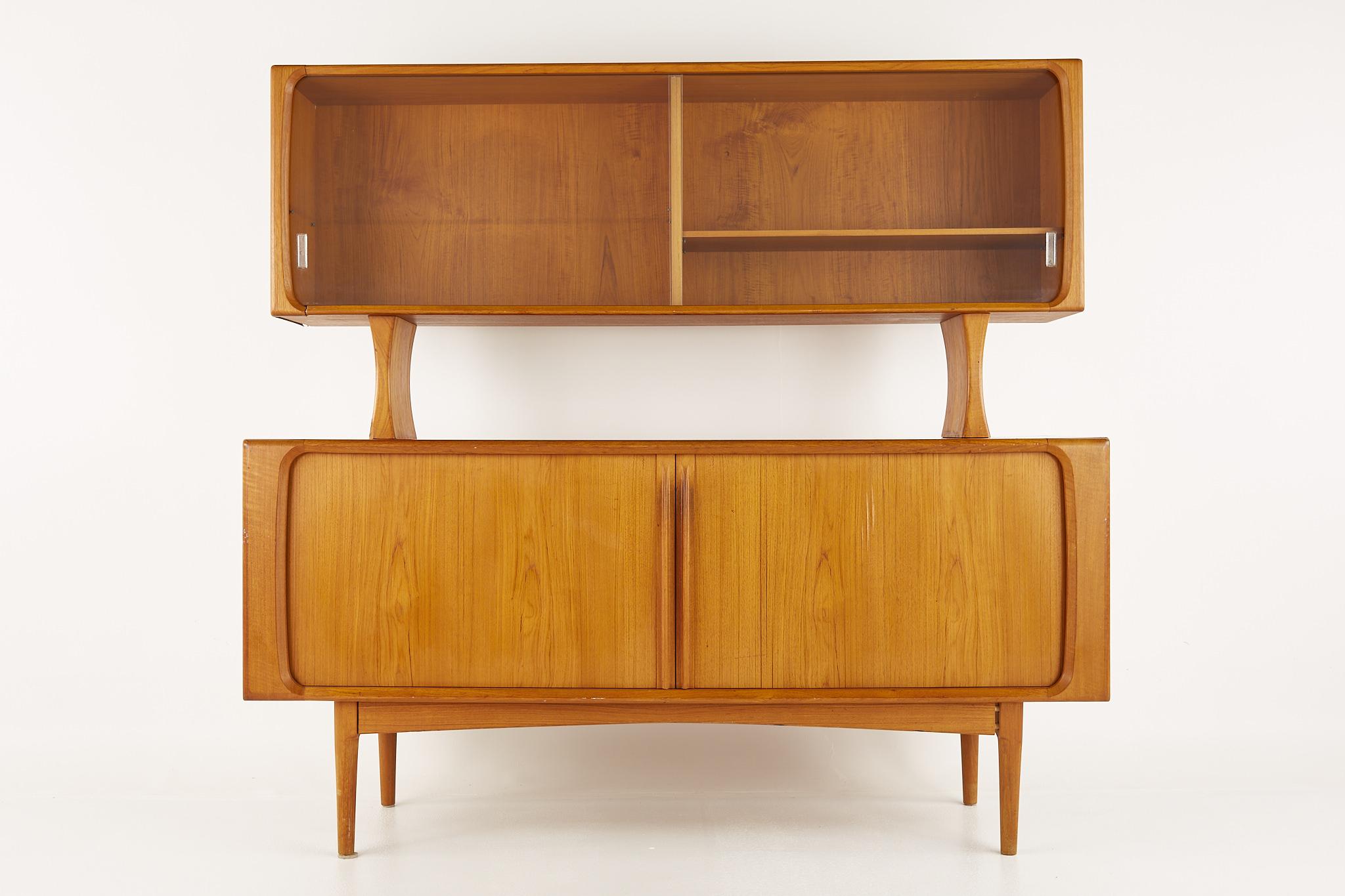 Bernhardt Pedersen mid century teak tambour door credenza with hutch

Credenza and hutch measures: 65 wide x 19.75 deep x 62 inches high

?All pieces of furniture can be had in what we call restored vintage condition. That means the piece is