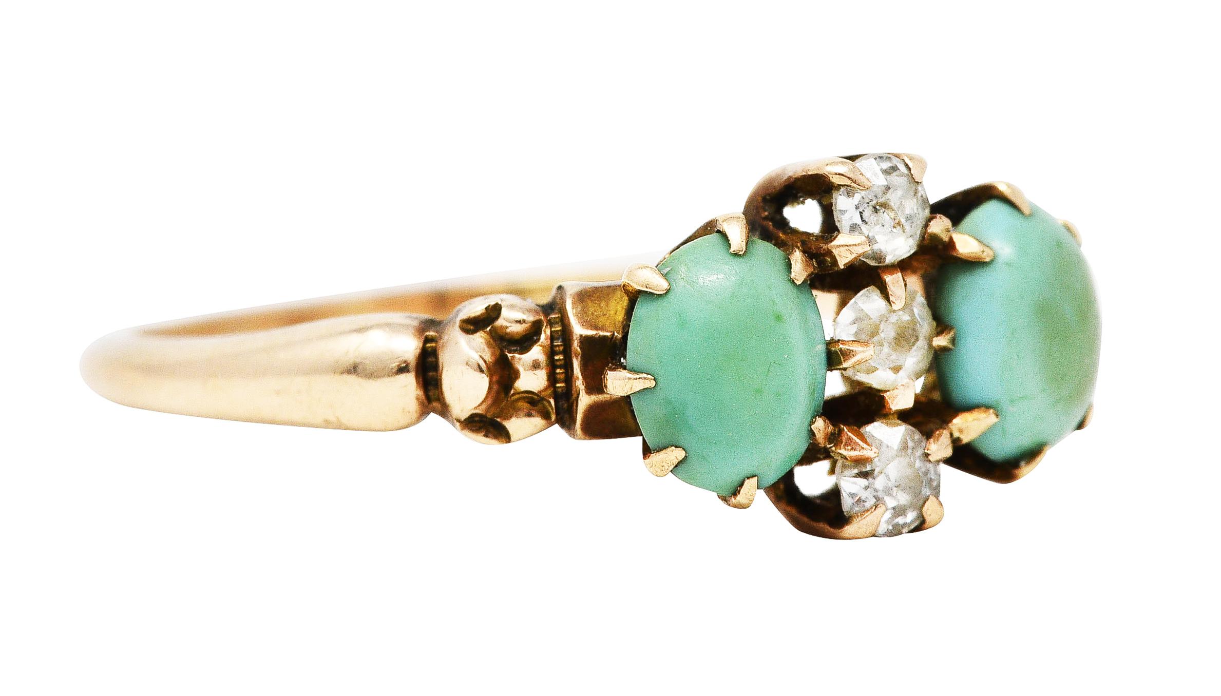 Ring centers a vertical row of prong set old single cut diamonds

Weighing approximately 0.12 carat - varied in color and quality

Flanked by two oval turquoise cabochons measuring 5.0 x 3.0 mm

Prong set and strongly greenish blue in color

With
