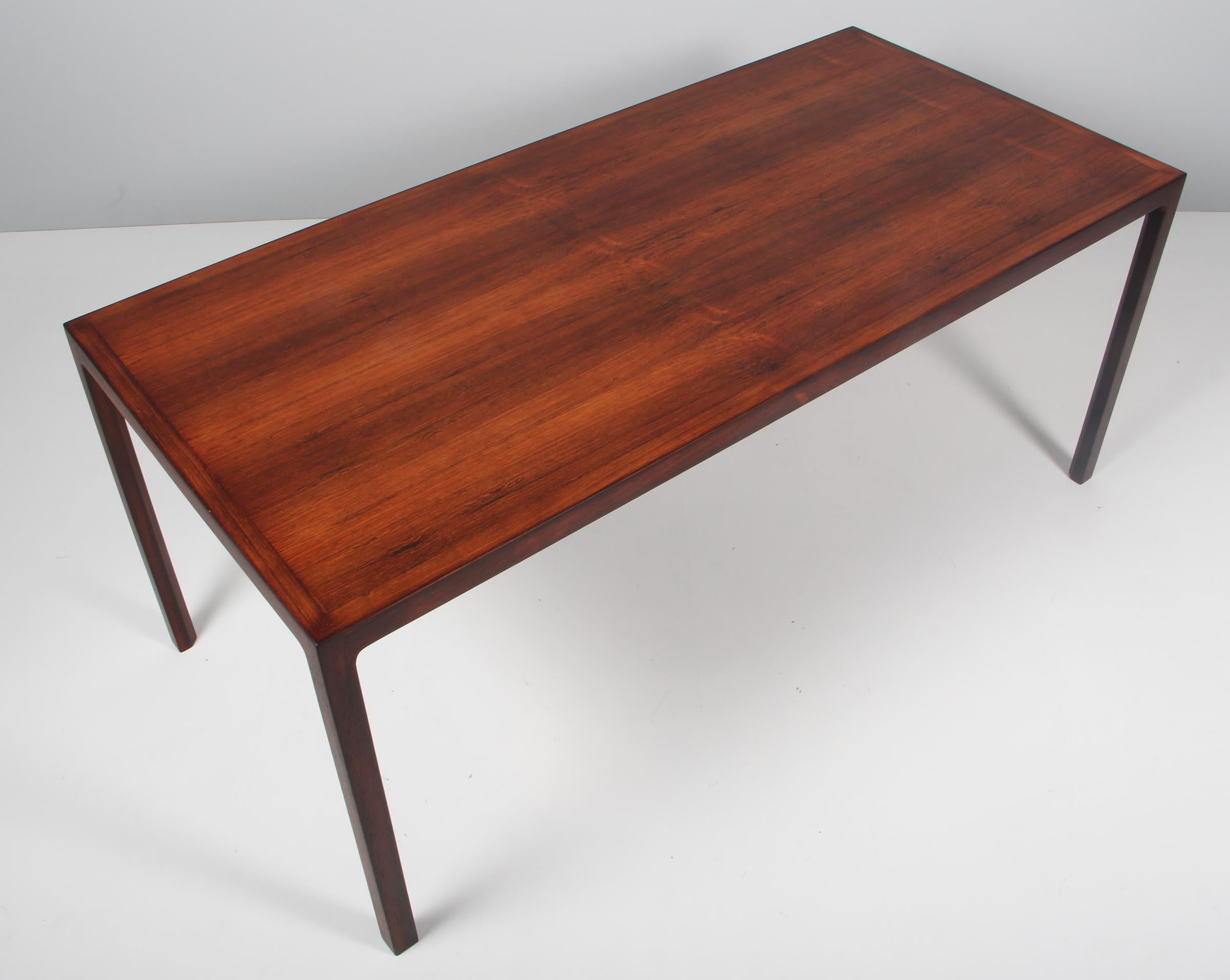 Bernt Pedersen coffee table made in partly solid rosewood. 

Made in Denmark in the 1960s.