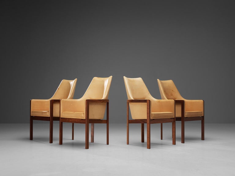 Bernt Petersen for Søborg Møbelfabrik, set of four dining chairs, leather, mahogany, Denmark, 1960s

Elegant and comfortable set of four dining chairs designed by Bernt Petersen in the 1960s. The chairs are executed in a mahogany frame and leather