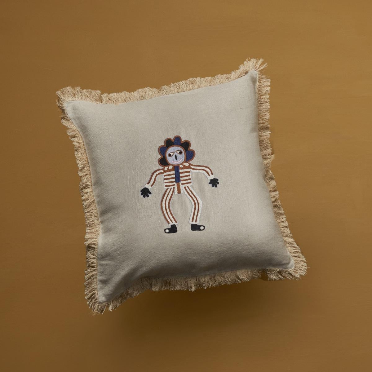 Meet Berre! Exclusive cushion cover crafted from fine beige linen with an imaginative character embroidered by hand. Also the fringe finishing is made by hand. Duck feather fillers can be ordered seperately. 100% linen 
Size 50 x 50 cm.