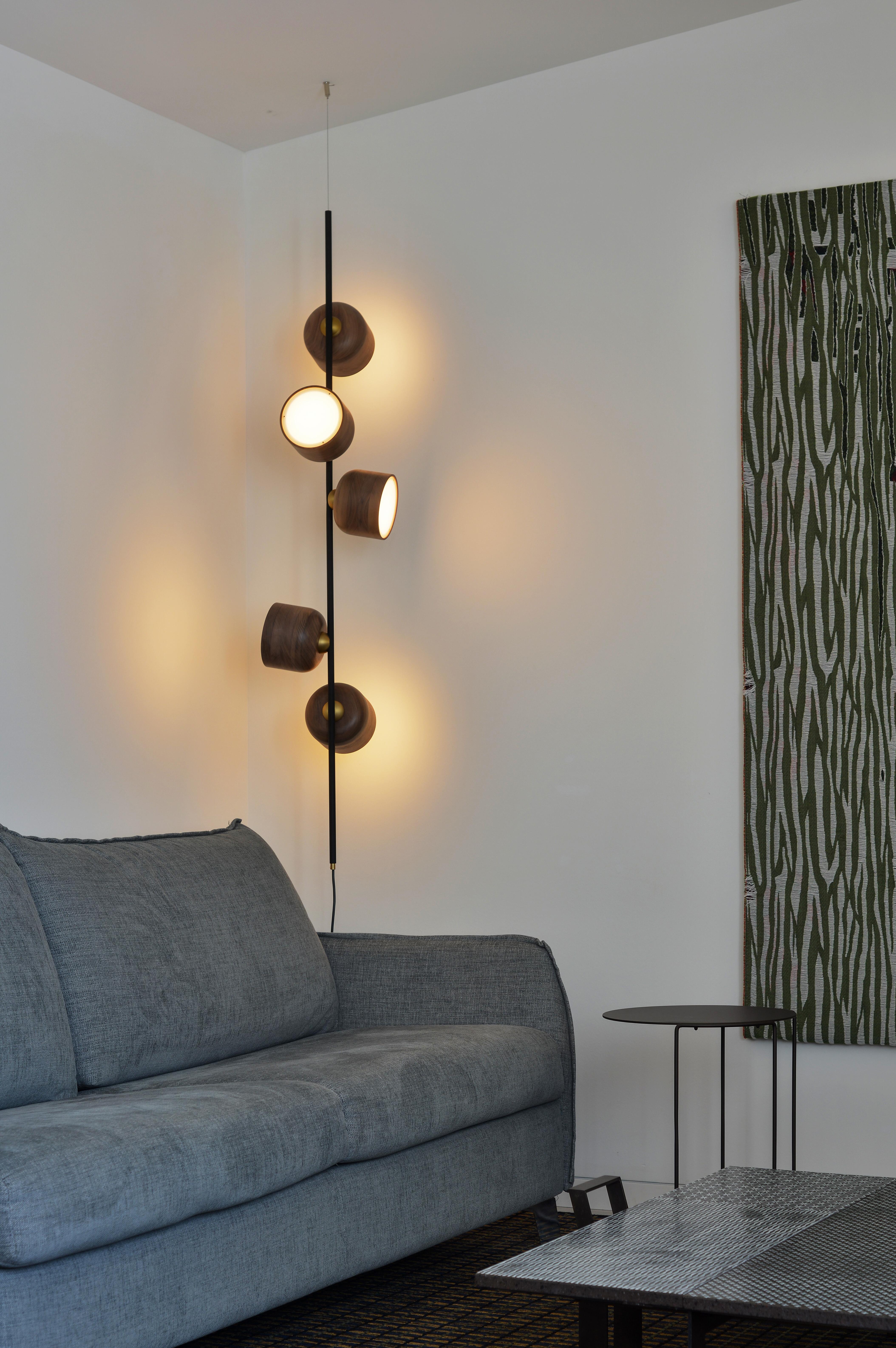 The Berries collection is ideal to create a warm and relaxing atmosphere. 
The shape of the Berries lampshade is defined mainly through interaction with their hosting branch. Each berry is made of wood and shaped in a way that makes it look as