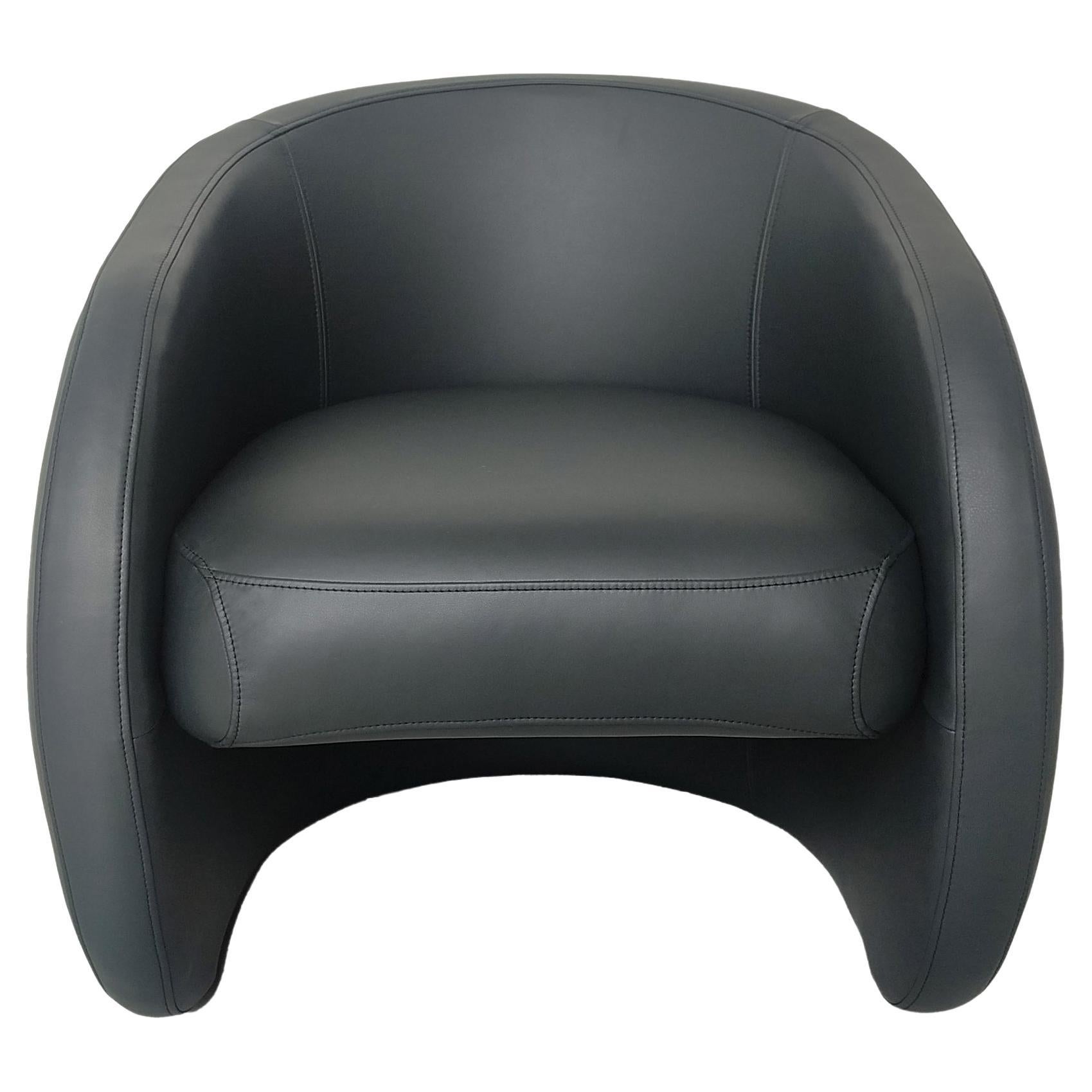 Berry armchair upholstered in Black leather by Bow and Arrow