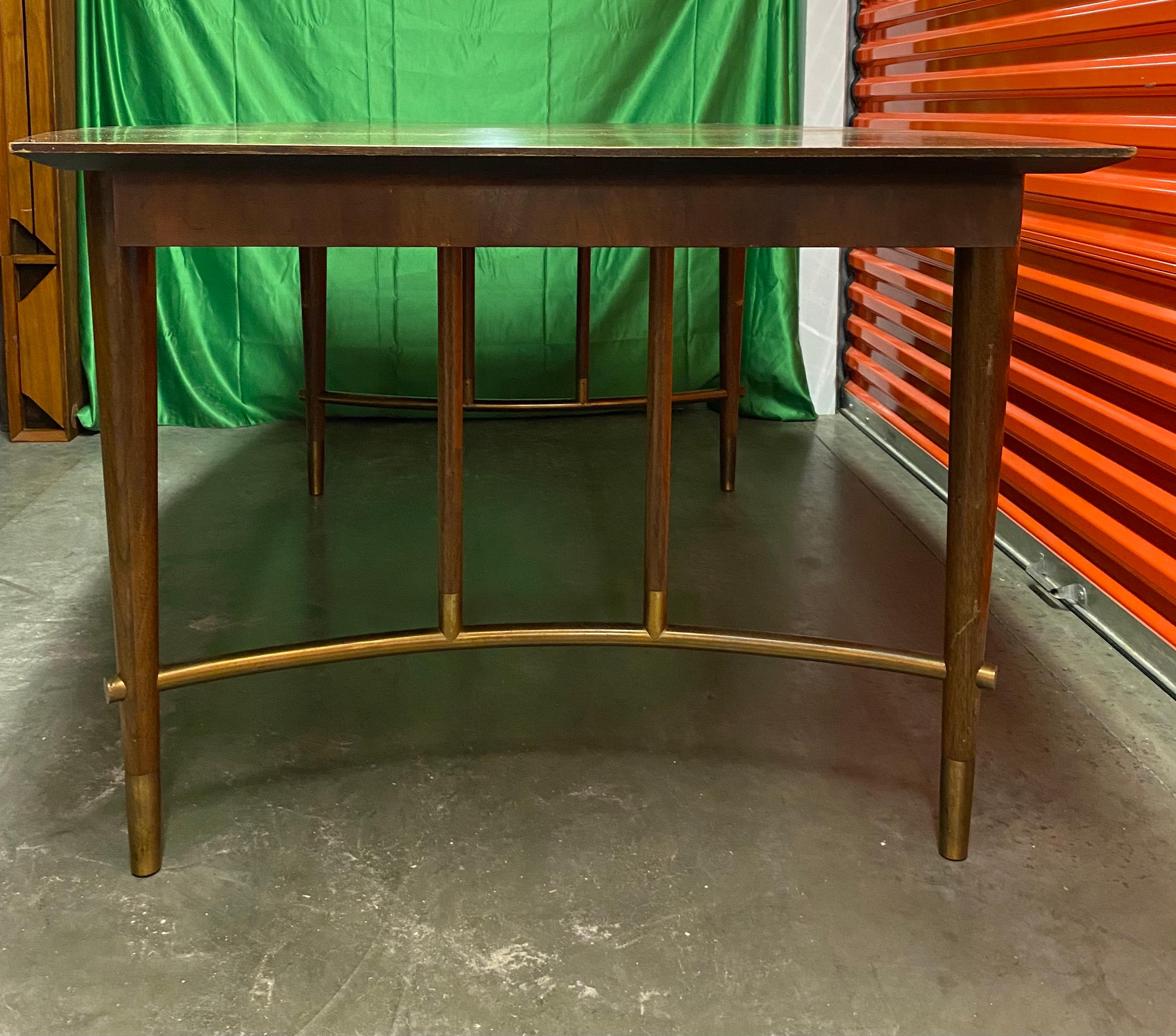 American Bert England Mid-Century Modern Walnut and Brass Dining Table with Curved Shape For Sale