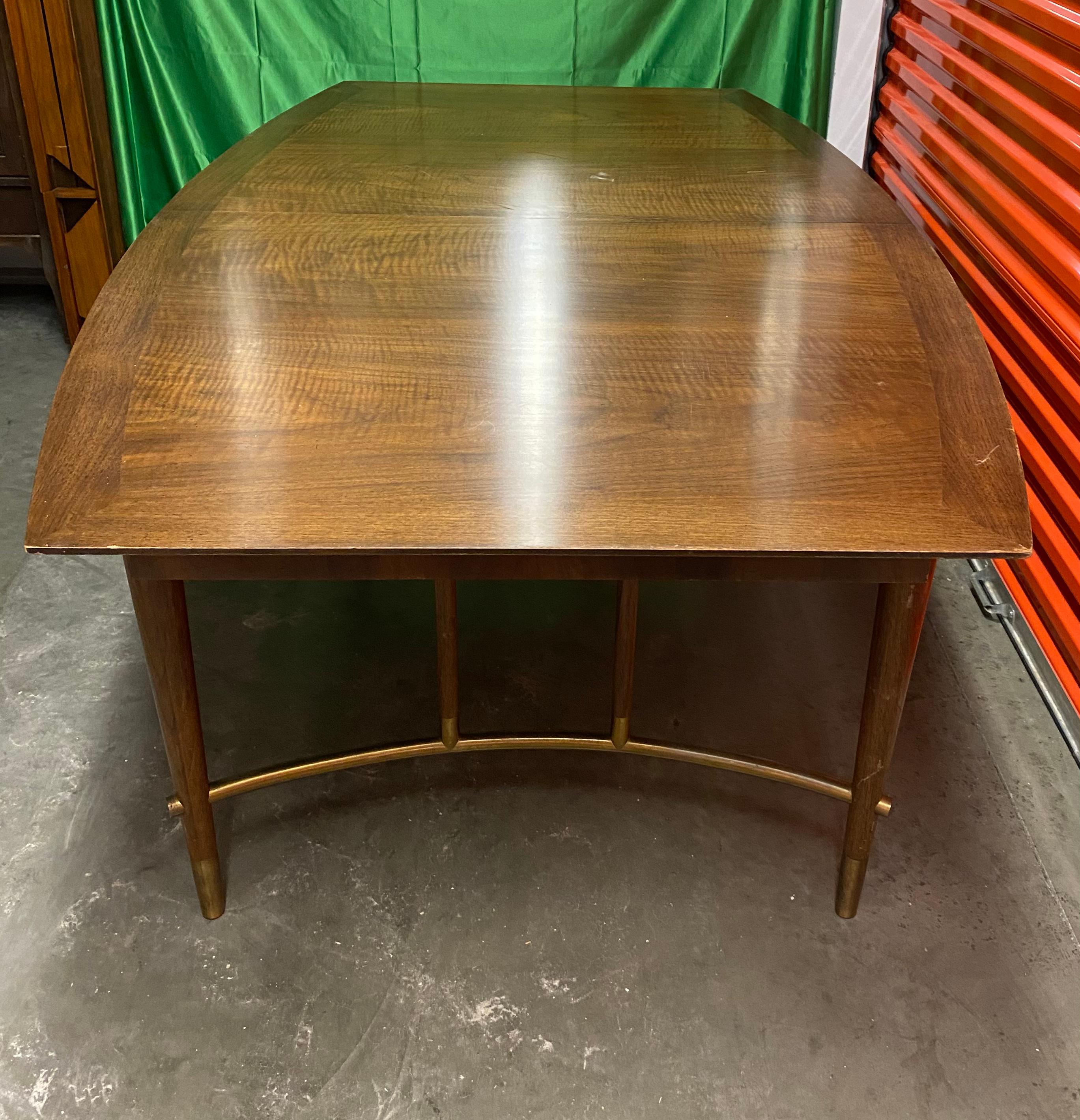 Bert England Mid-Century Modern Walnut and Brass Dining Table with Curved Shape In Good Condition For Sale In Downingtown, PA