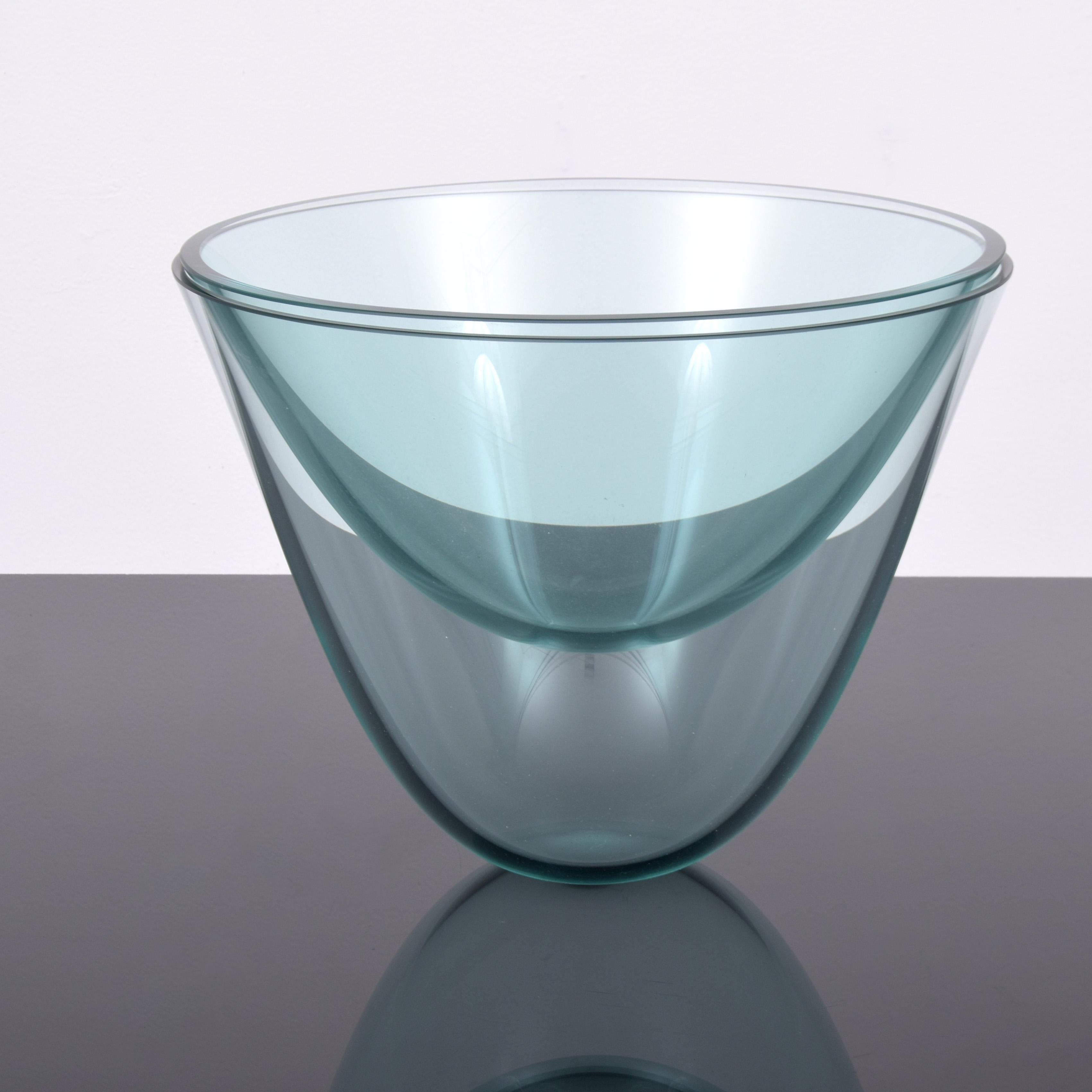 Artist/Designer: Bert Frijns (Dutch, b. 1953)
Marking(s); notes: signed; 1997
Country of origin; materials: Netherlands; blown glass
Dimensions: 12″h, 13.25″dia; 9″h, 14″dia
Additional Information: Work is titled “Stacking Vase 1, #16.” Item is