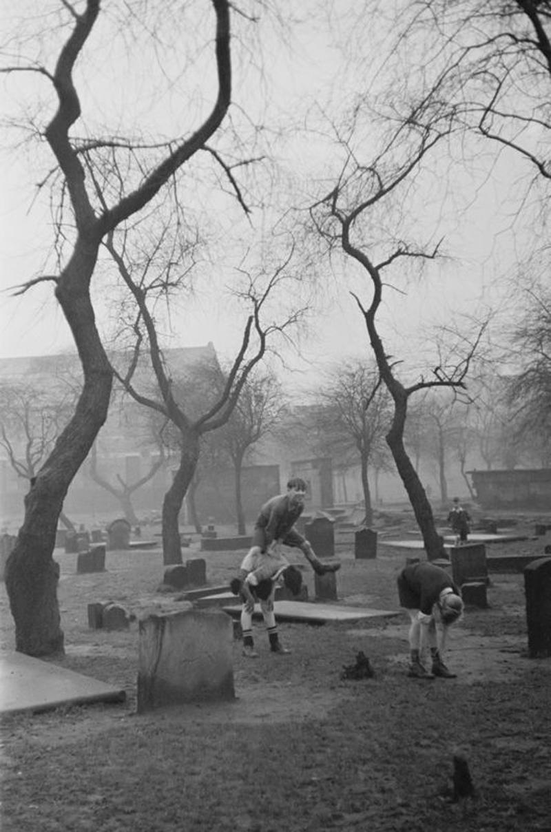 Graveyard Leapfrog - Photograph by Bert Hardy