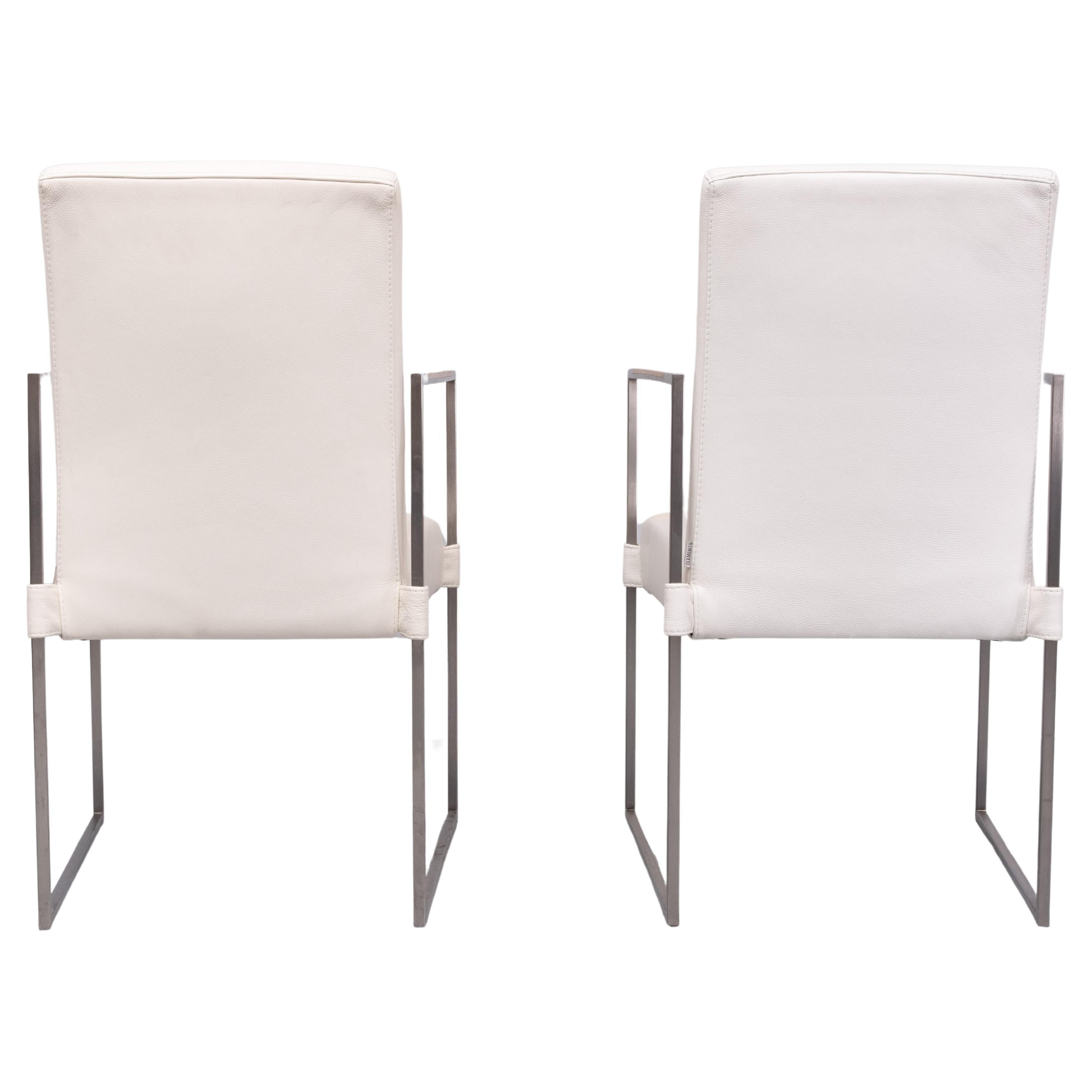 Very nice pair of adjustable armchairs . Polished Aluminum 
square frame ,with Wood armrests inserts  ,comes with a White Leather upholstery . Adjustable backrest . by pulling a lever underneath the seat  Looks like a Milo Baughman design . However
