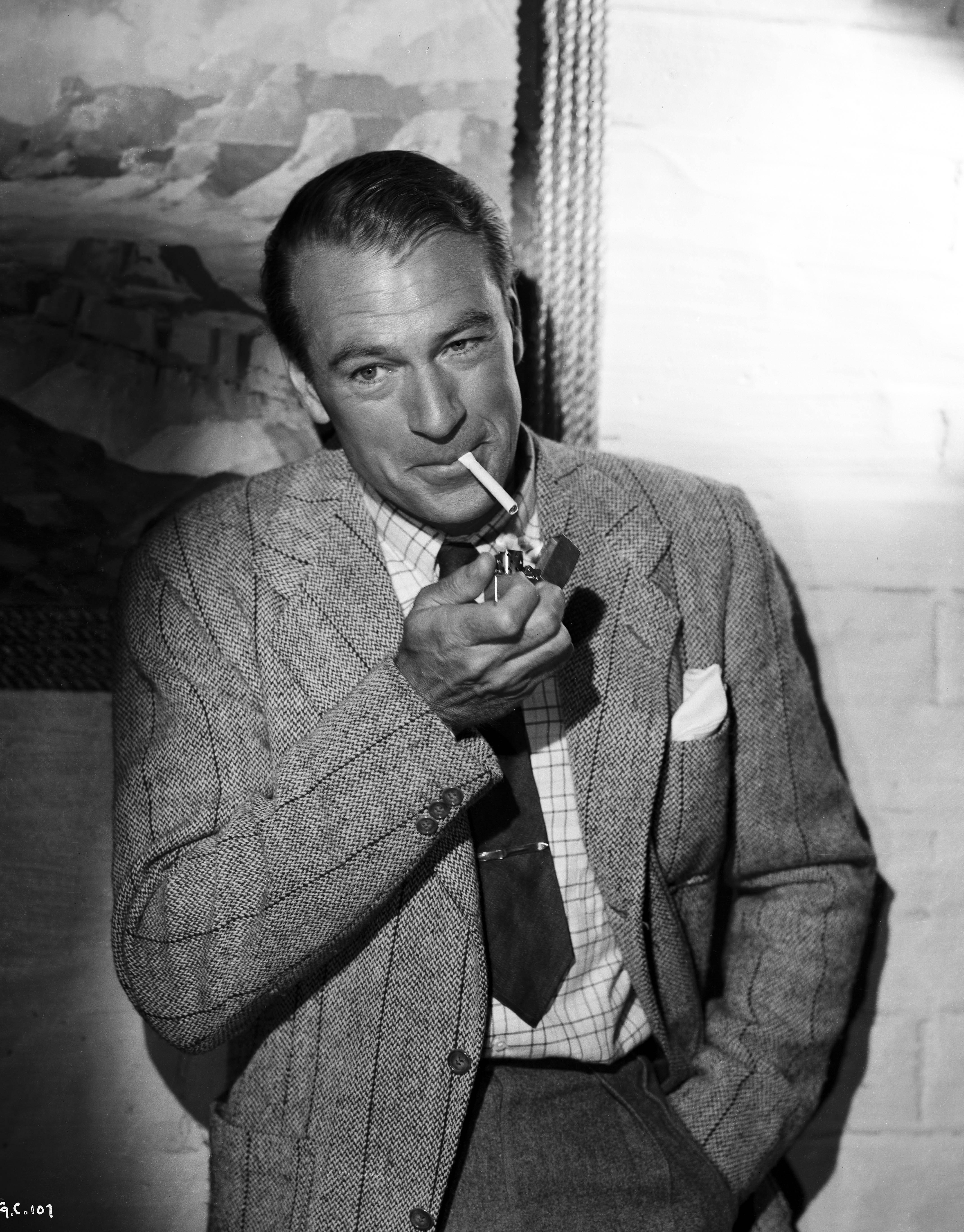 Bert Six Black and White Photograph - Gary Cooper Smoking a Cigarette Fine Art Print