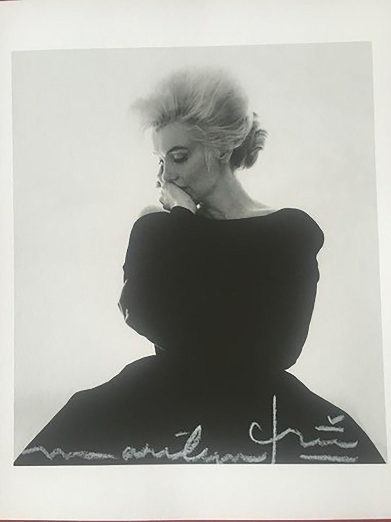 Exceptional photo of Marilyn in her Dior black dress during her last session for Vogue magazine.
Photographed by Bert Stern.
Very limited edition of 72 copies.
Signed on the front and back.

The certificate of authenticity was completed by Bert