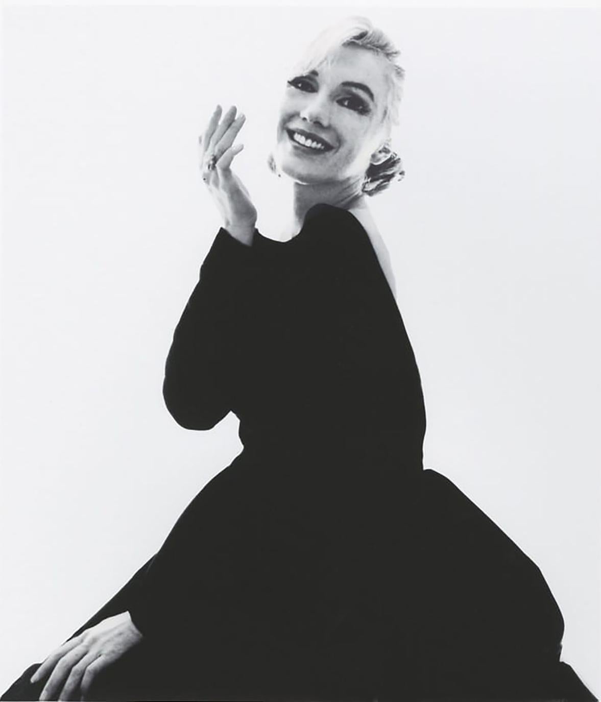Bert Stern Portrait Photograph - Bert stern Marilyn smiling at you in black dress
