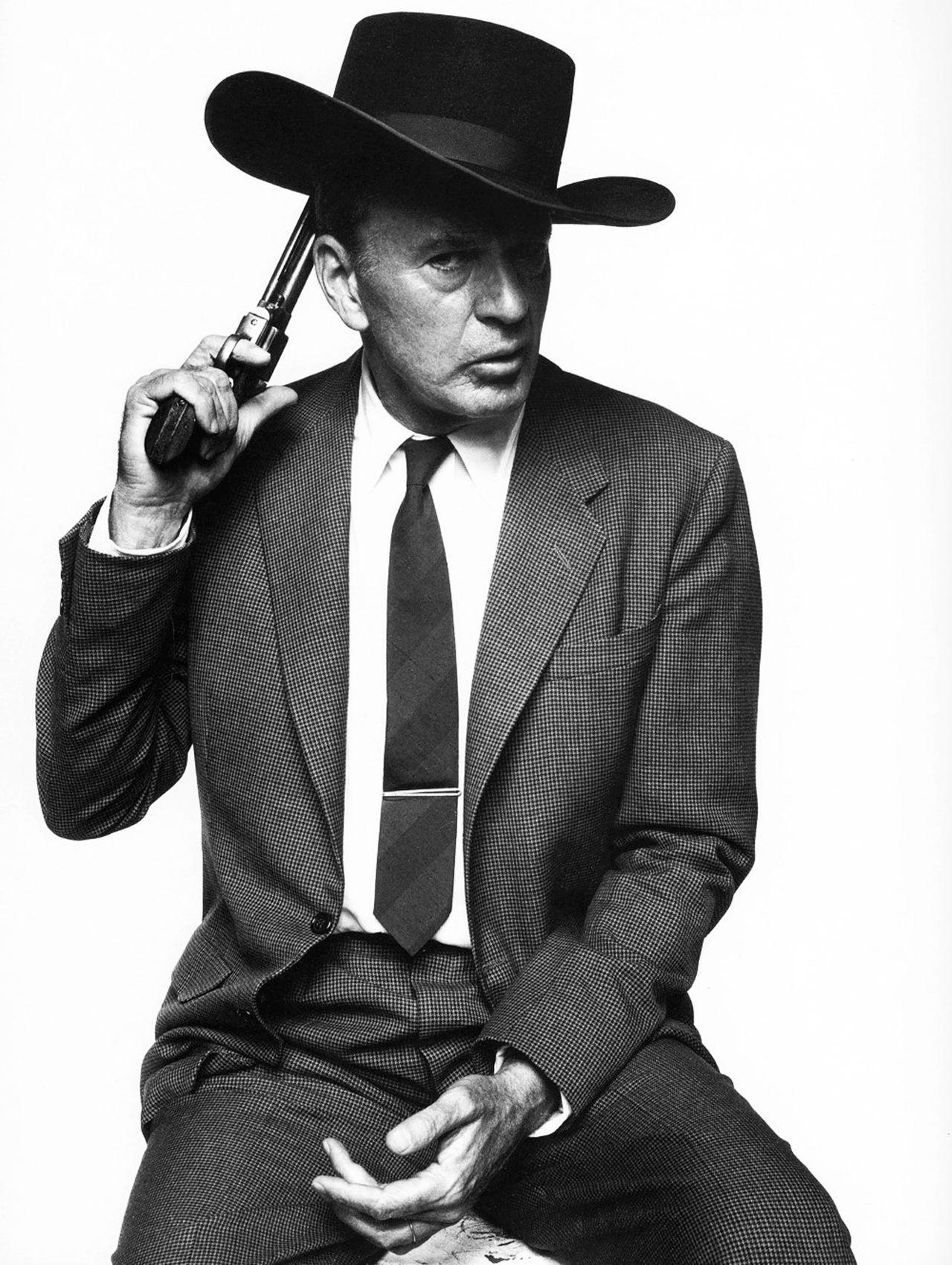 Bert Stern Black and White Photograph - Gary Cooper with Gun and Cowboy Hat, Esquire Magazine