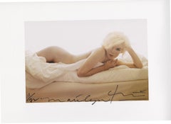 Marilyn Monroe . New baby on the bed . The last sitting