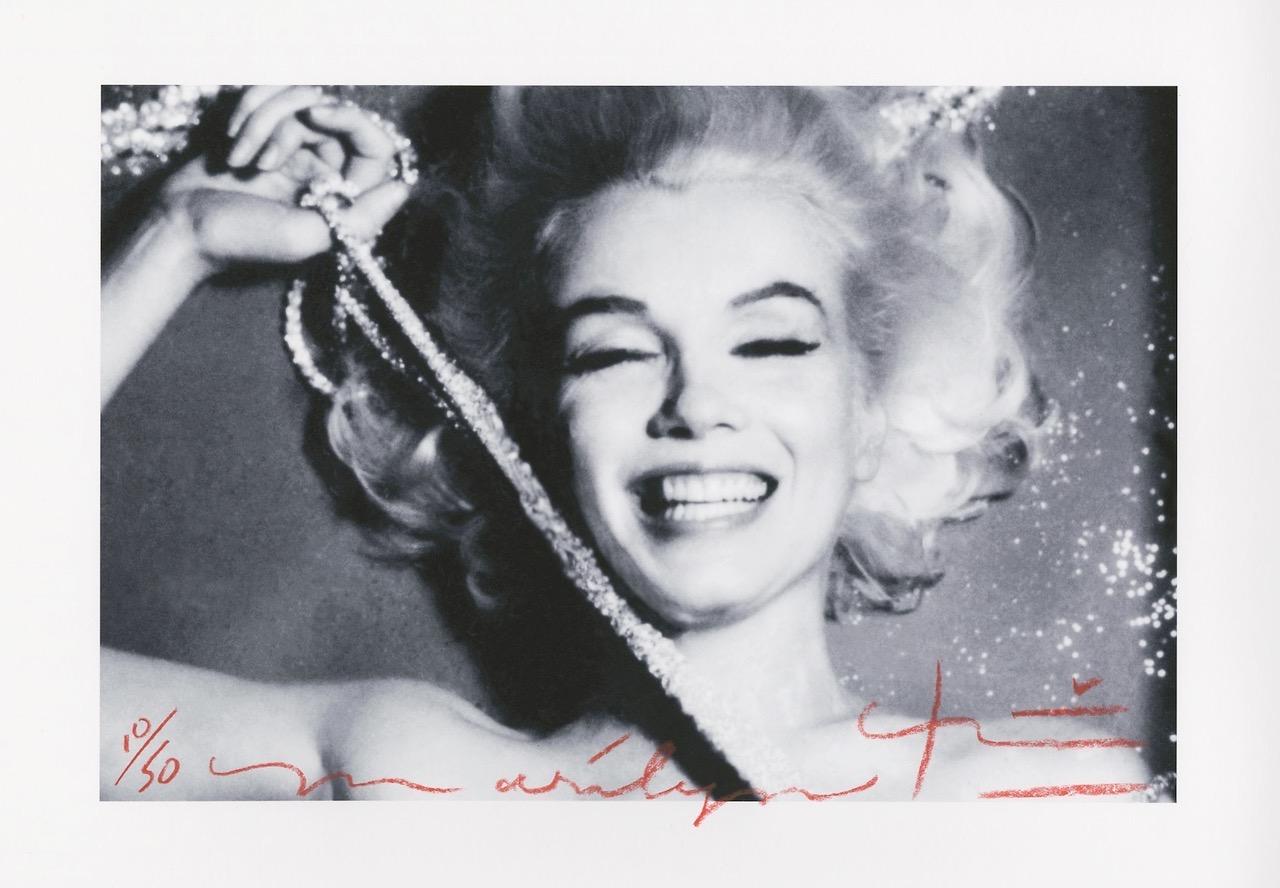 Marilyn Monroe  The last sitting Pearls 2 by Bert Stern .