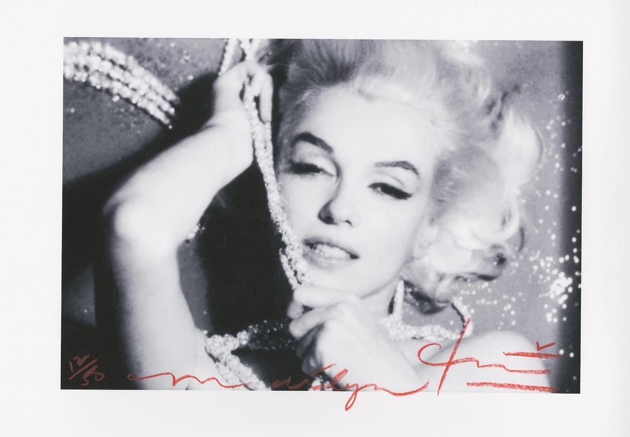 Marilyn Monroe  The last sitting Pearls 3 by Bert Stern .