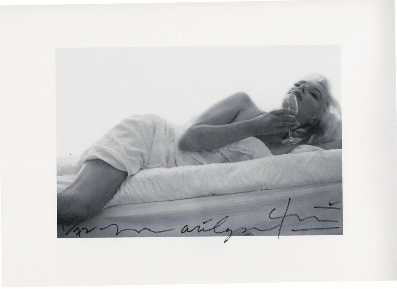 Bert Stern Portrait Photograph - Marilyn Monroe . Wine on the bed . The last sitting (1964)