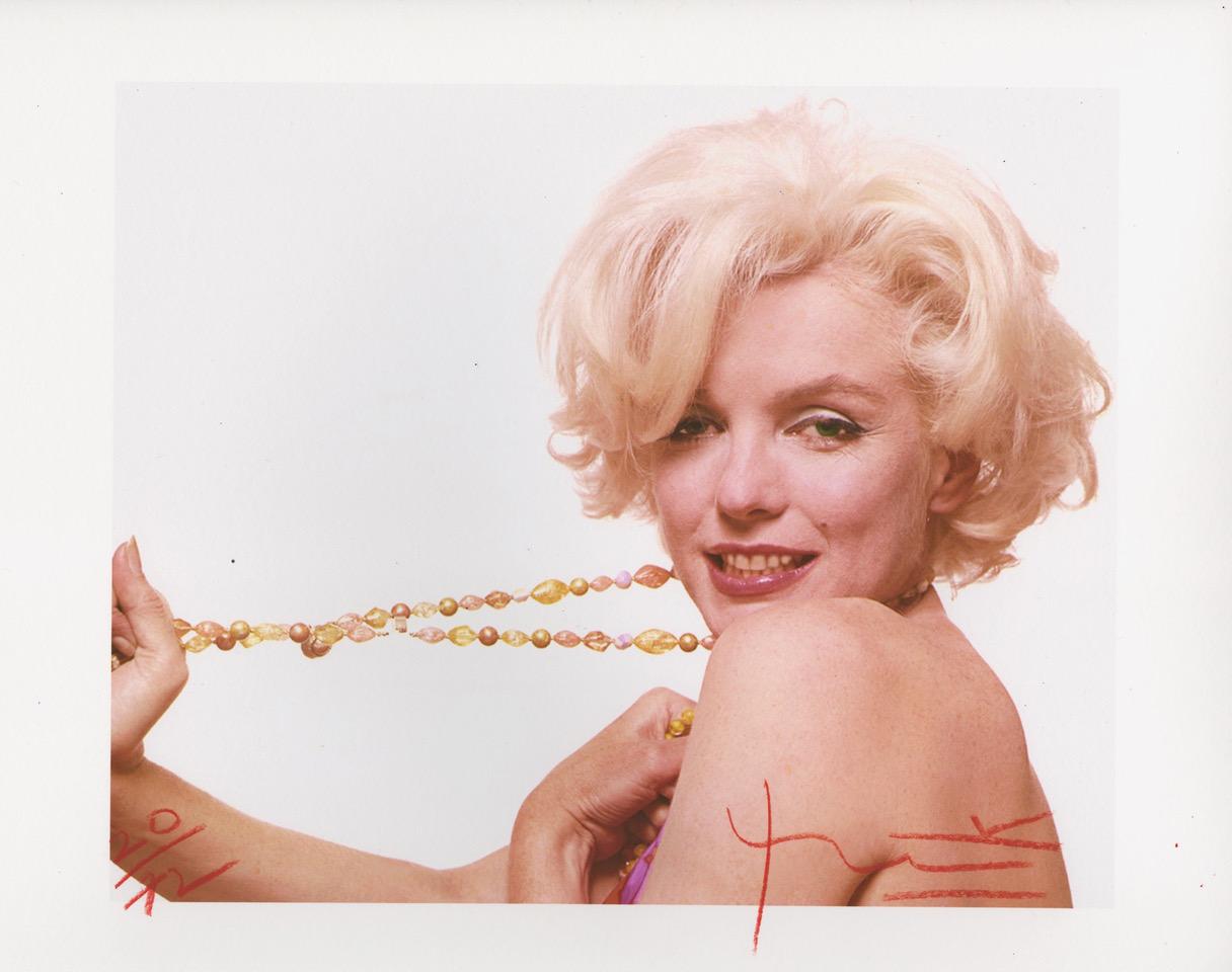 Bert Stern Portrait Photograph - Marilyn Stretching the Jewelry 